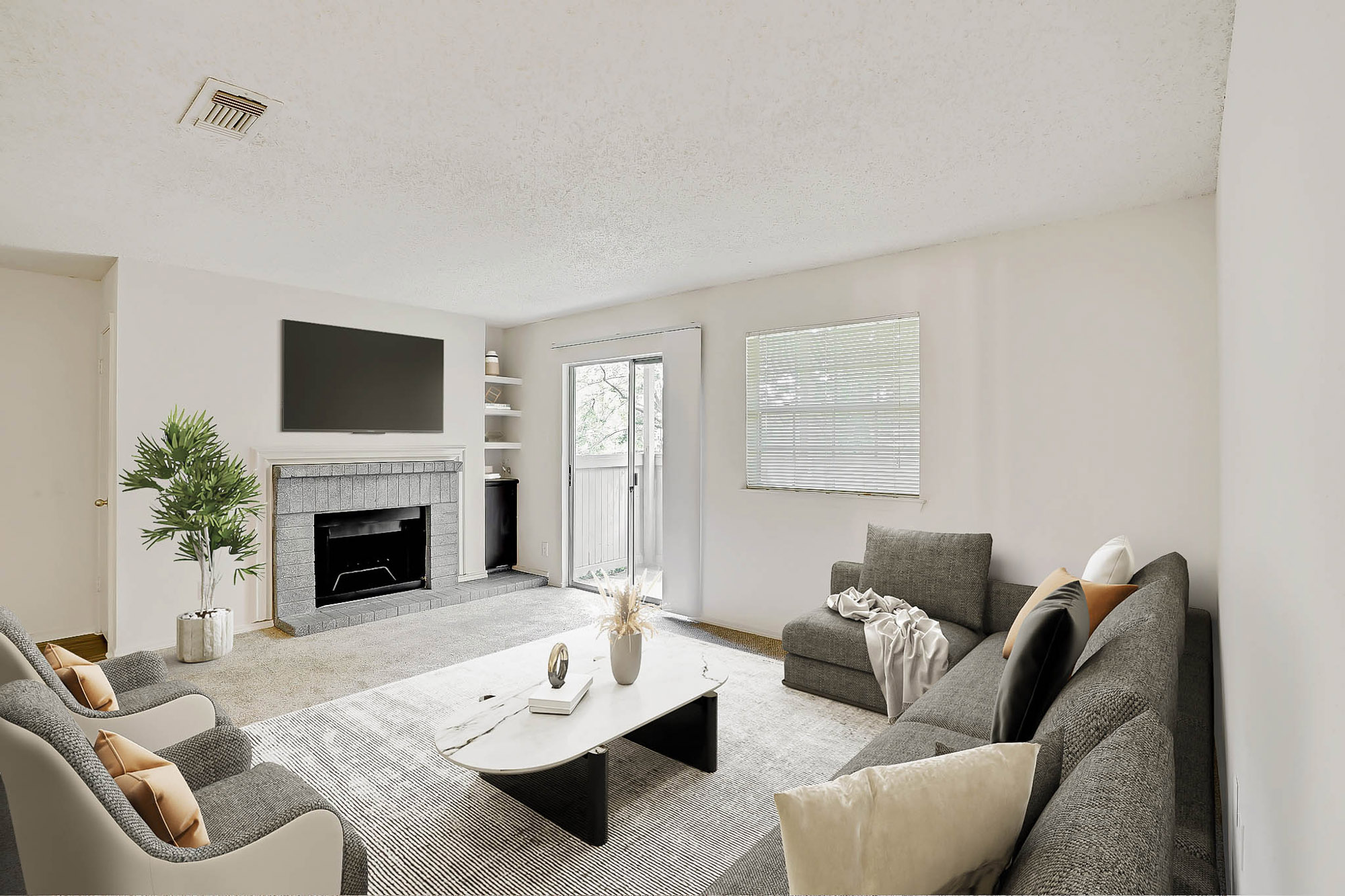 The living area in an apartment at The Gables of McKinney in McKinney, TX.