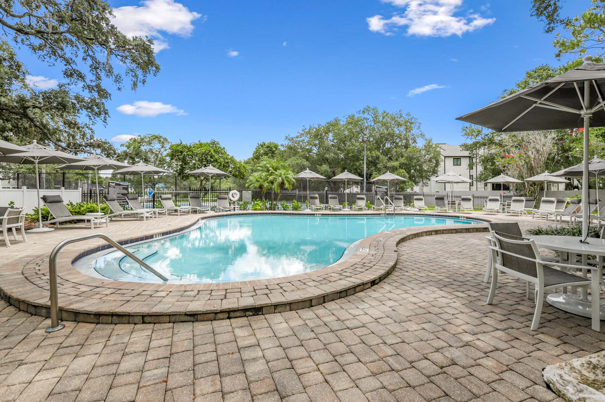 The pool at Oak Ramble apartments in Tampa, FL.