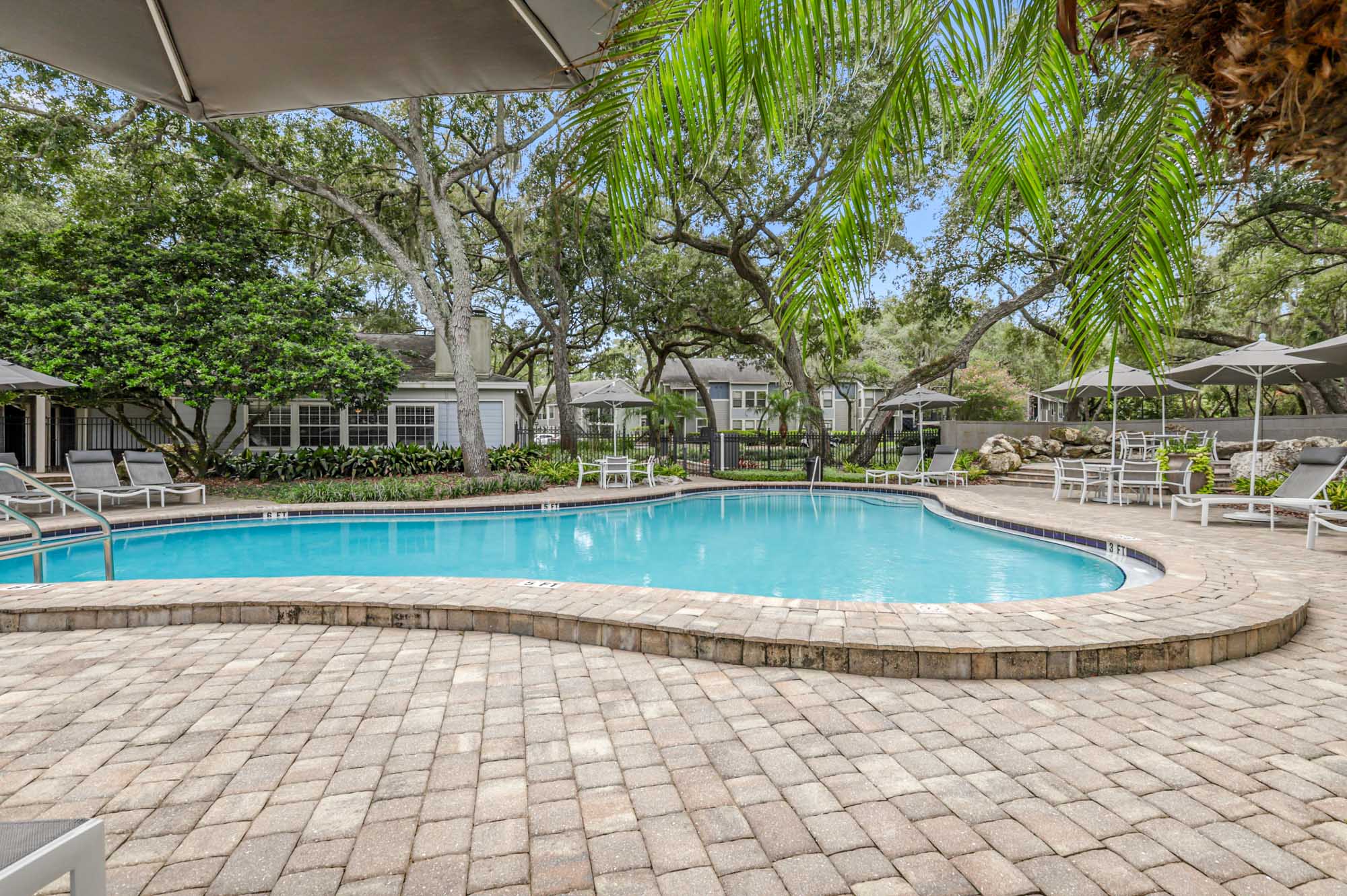 The pool at Oak Ramble apartments in Tampa, FL.