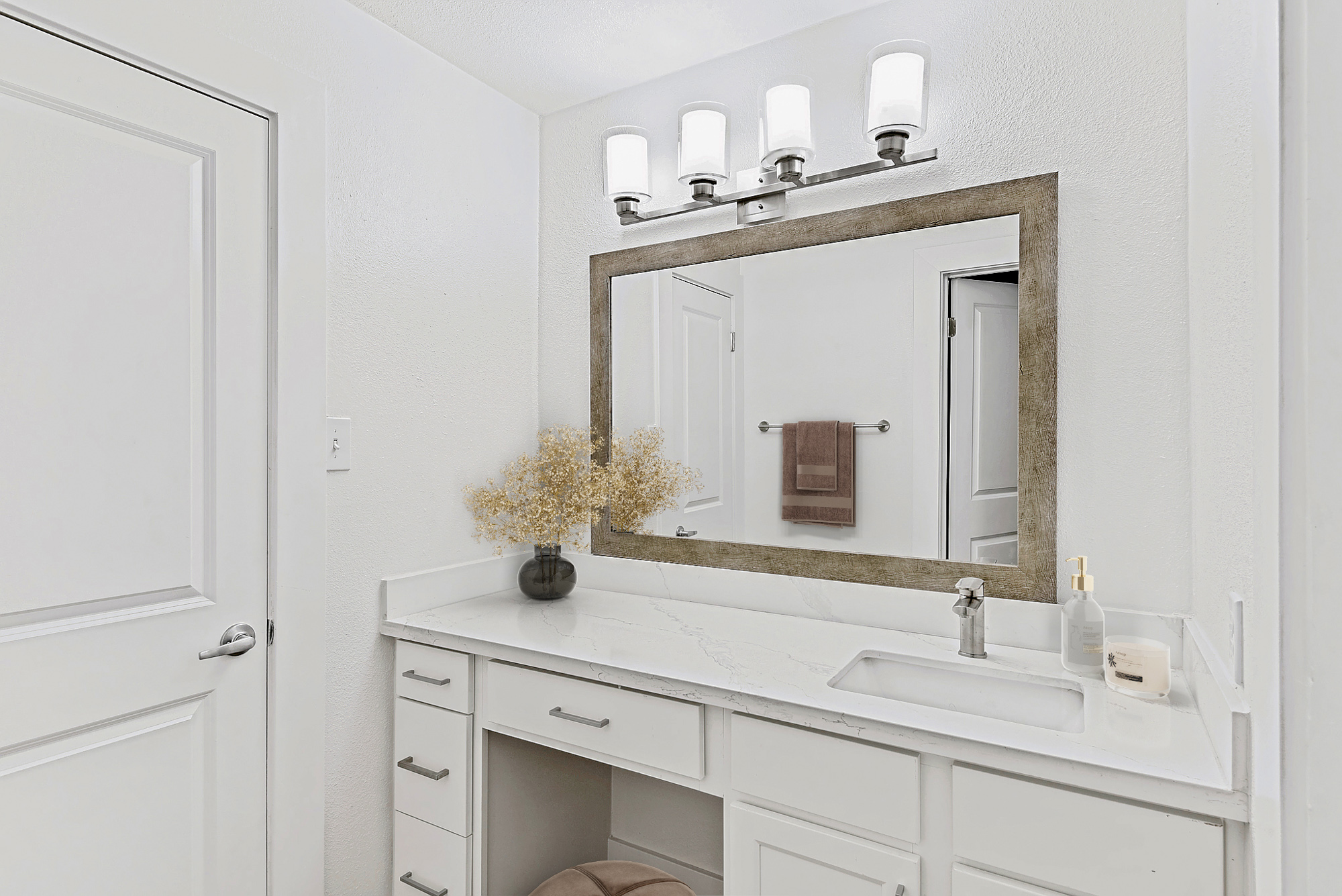 The bathroom of an apartment at The Arbors of Wells Branch in Austin, TX.