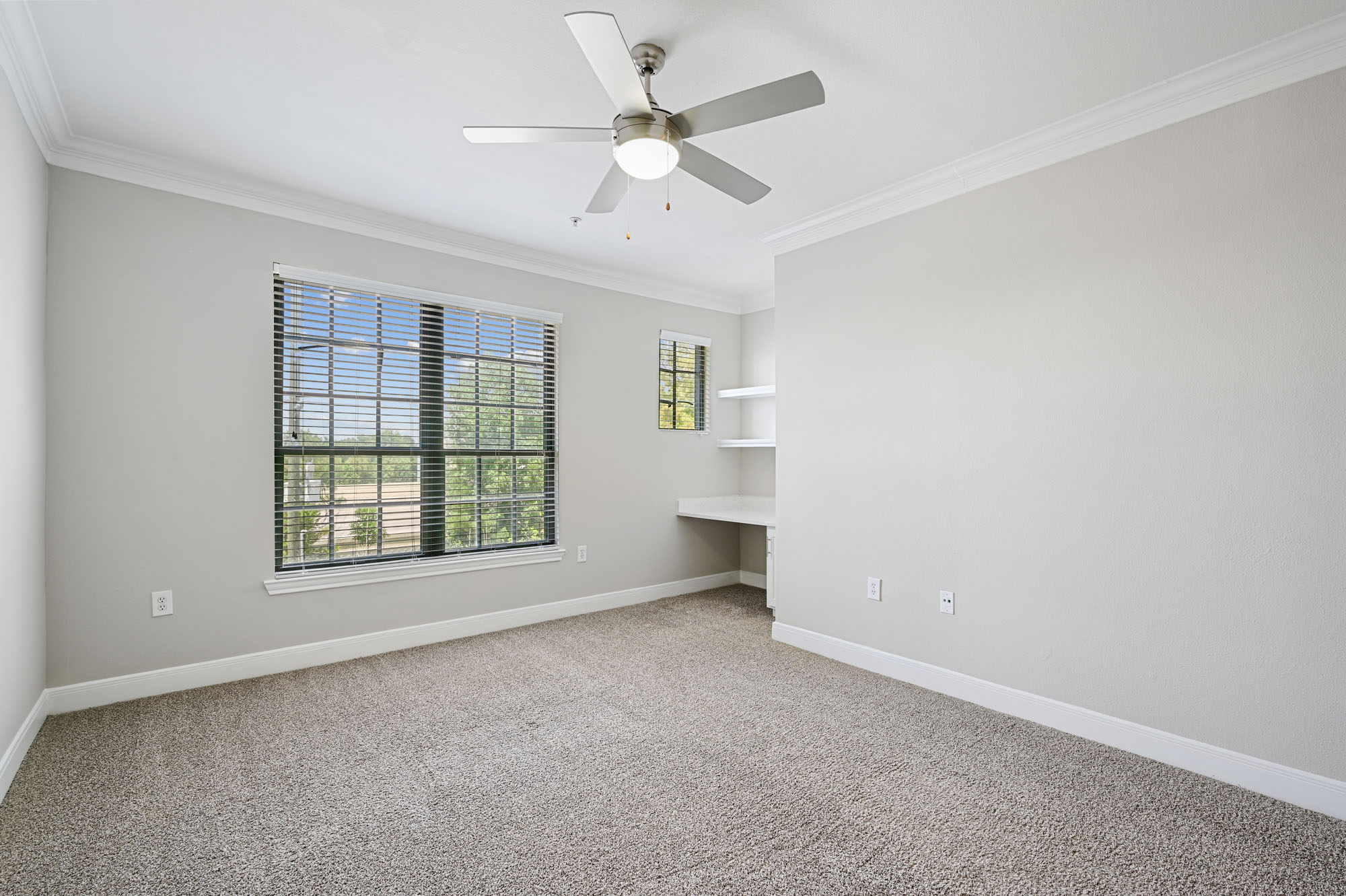 The bedroom in a Village on Memorial townhouse in Houston, TX.