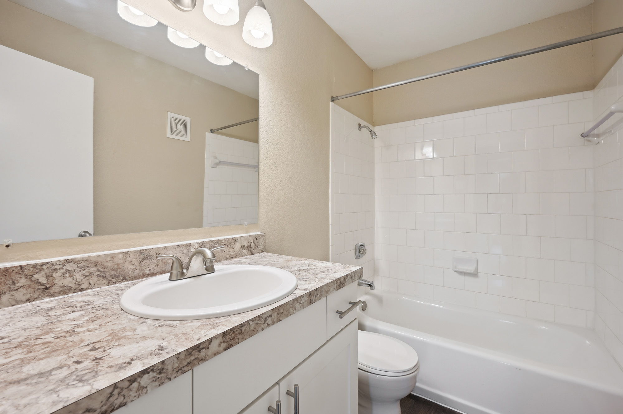 The bathroom at Lake Village West apartments in Garland, TX.