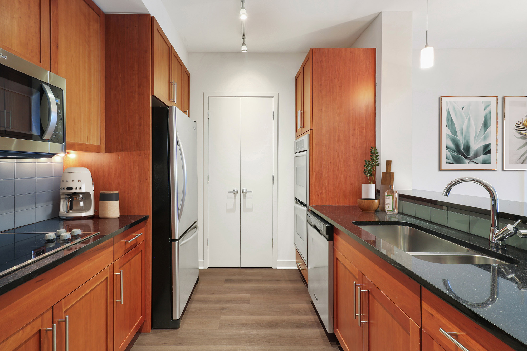 A kitchen at SKY55 apartments in Chicago, IL