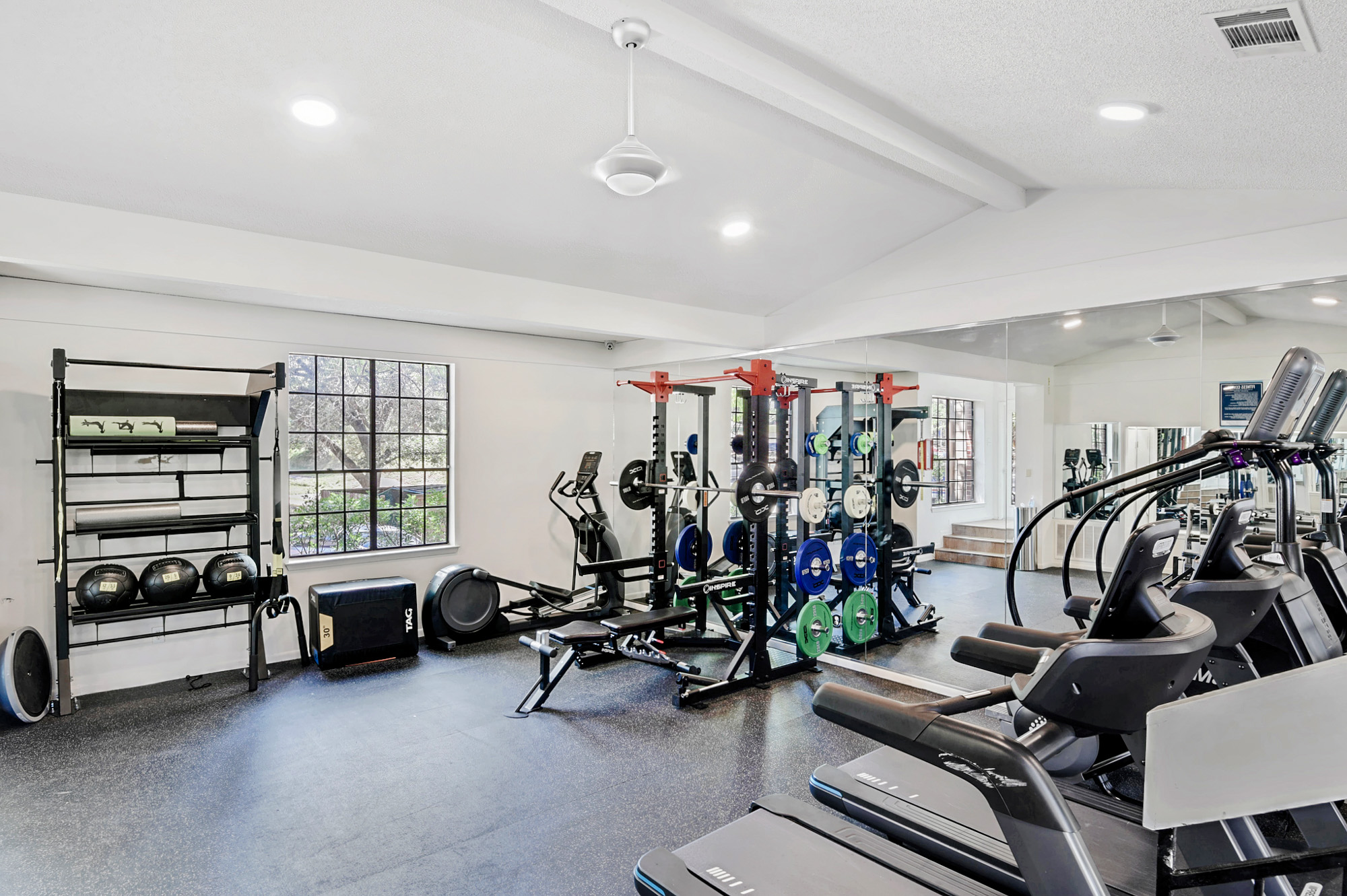 The fitness center at The Arbors at Wells Branch apartments in Austin, TX.