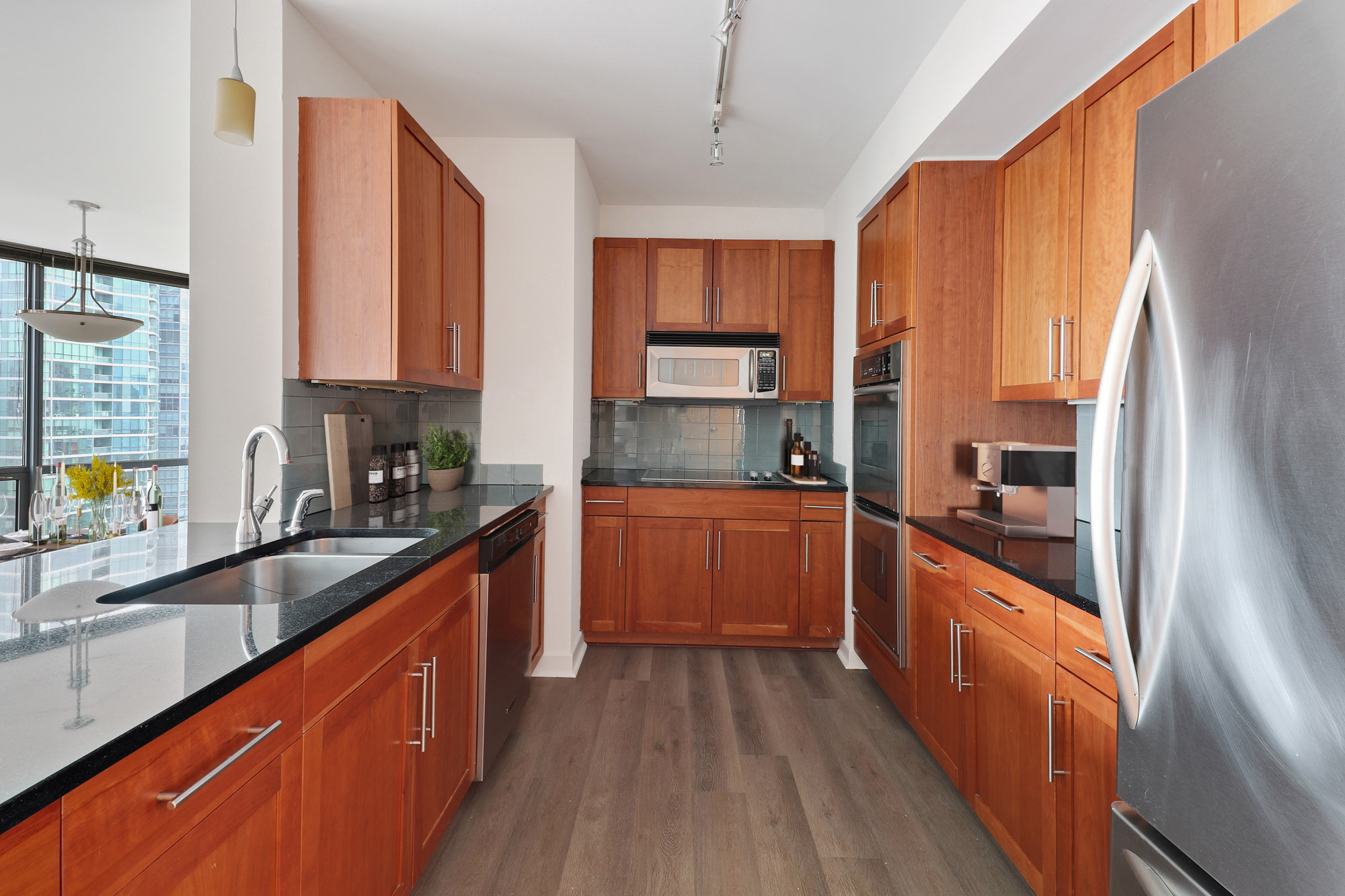 A kitchen at SKY55 apartments in Chicago, IL