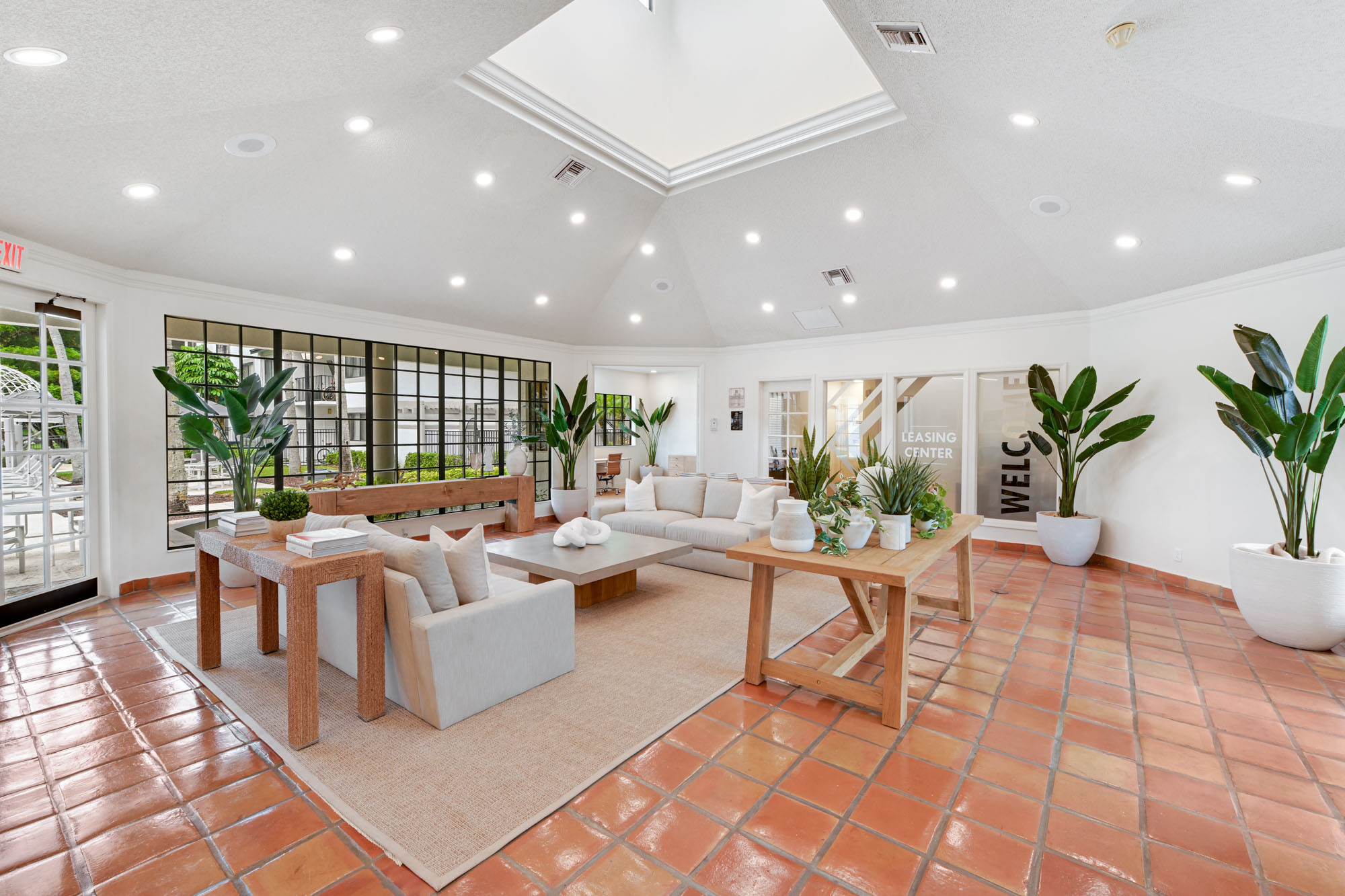 The interior of the Welcome Center lounge at The Reserve at Ashley Lake apartments for rent in Boynton Beach