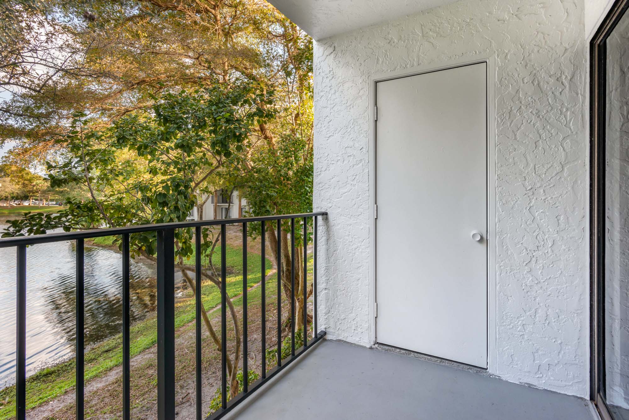 The balcony of an apartment at The Reserve at Ashley Lake Apartments