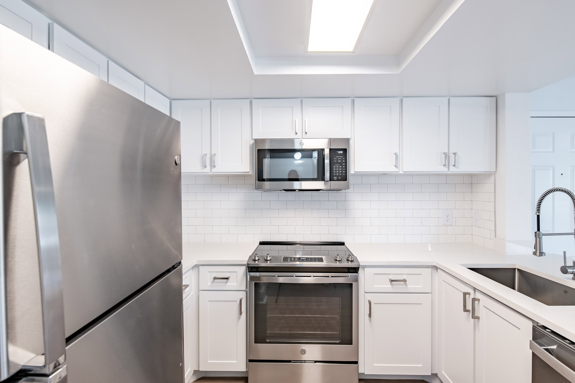 The interior of a kitchen at The Reserve at Ashley Lake apartments.