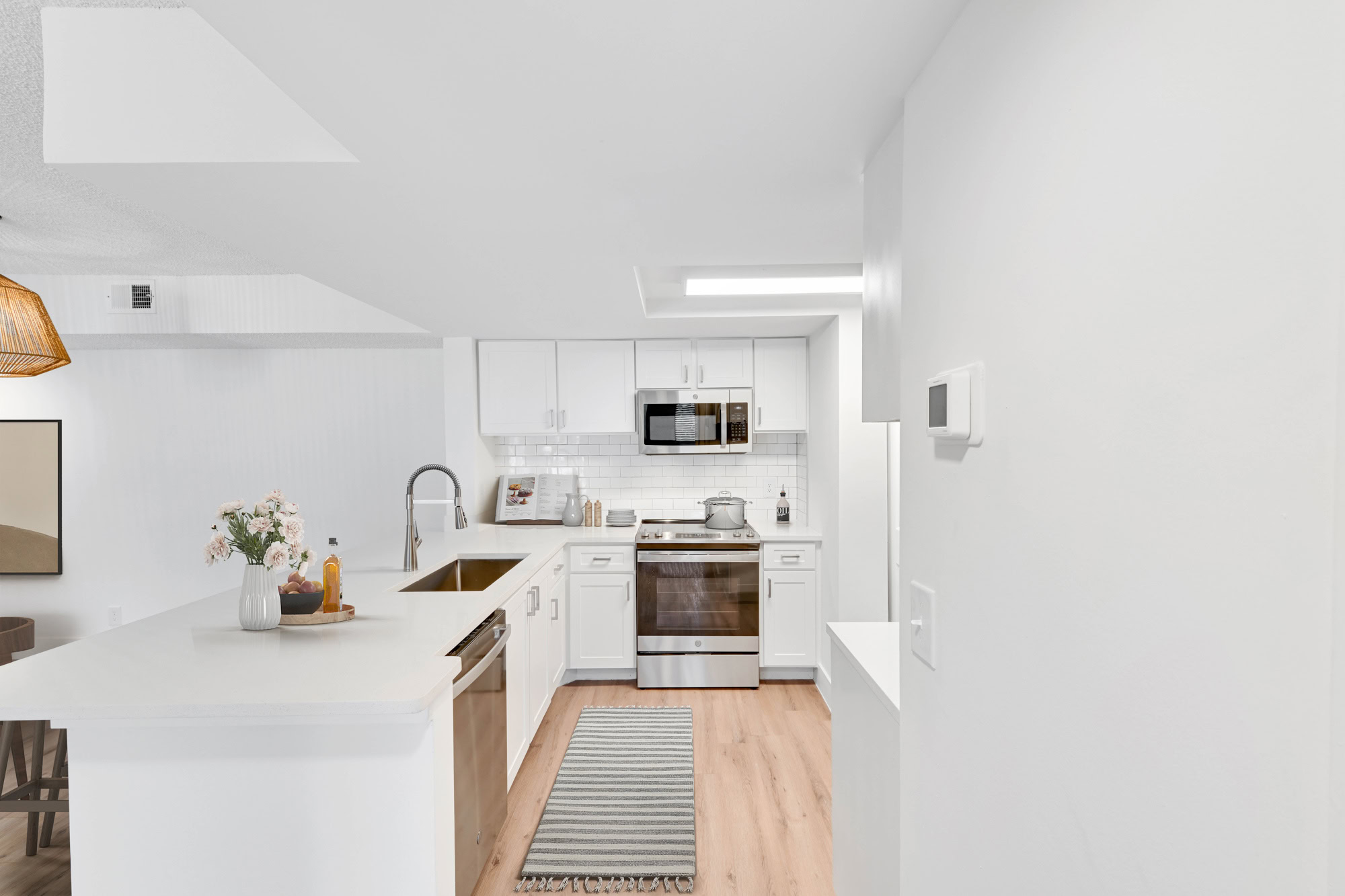 The interior of a kitchen at The Reserve at Ashley Lake apartments.