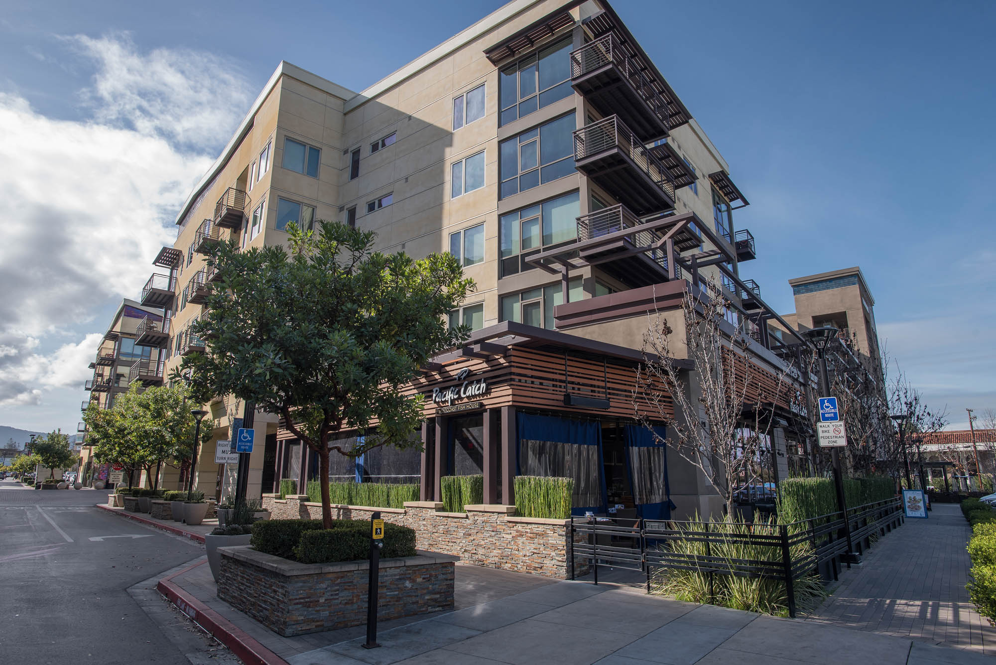 An exterior image of the corner of the Village of Residences in Mountain View, CA