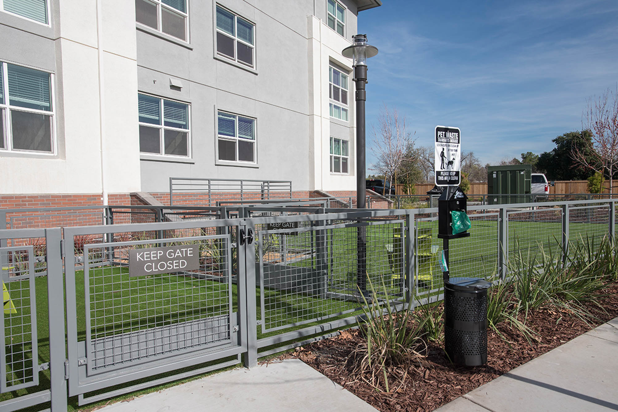 A gated outdoor dog run at the Vintage apartments in Pleasanton, CA