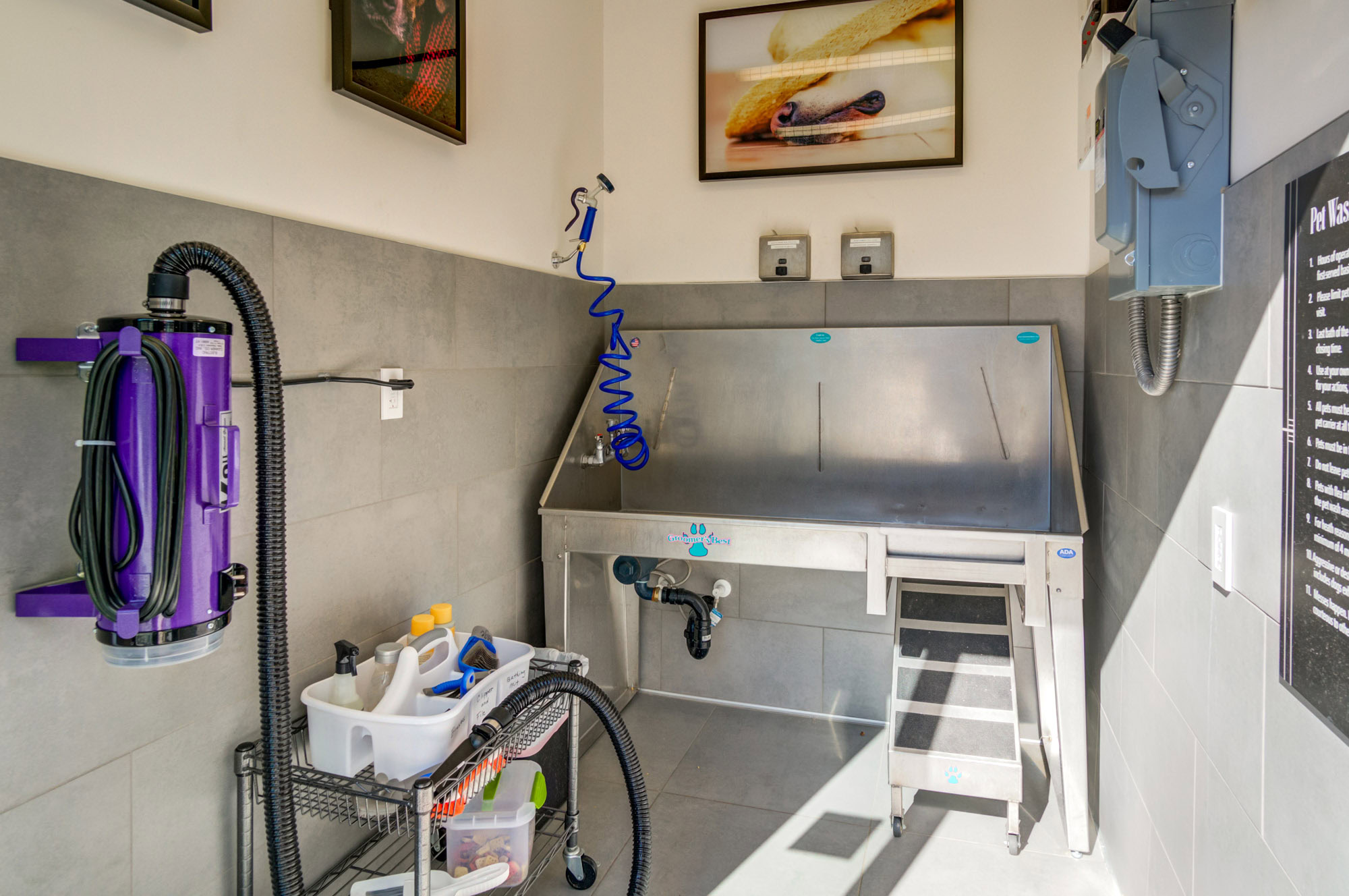 A fully equipped dog spa with a hair dryer at the Vintage luxury apartments in Pleasanton, CA