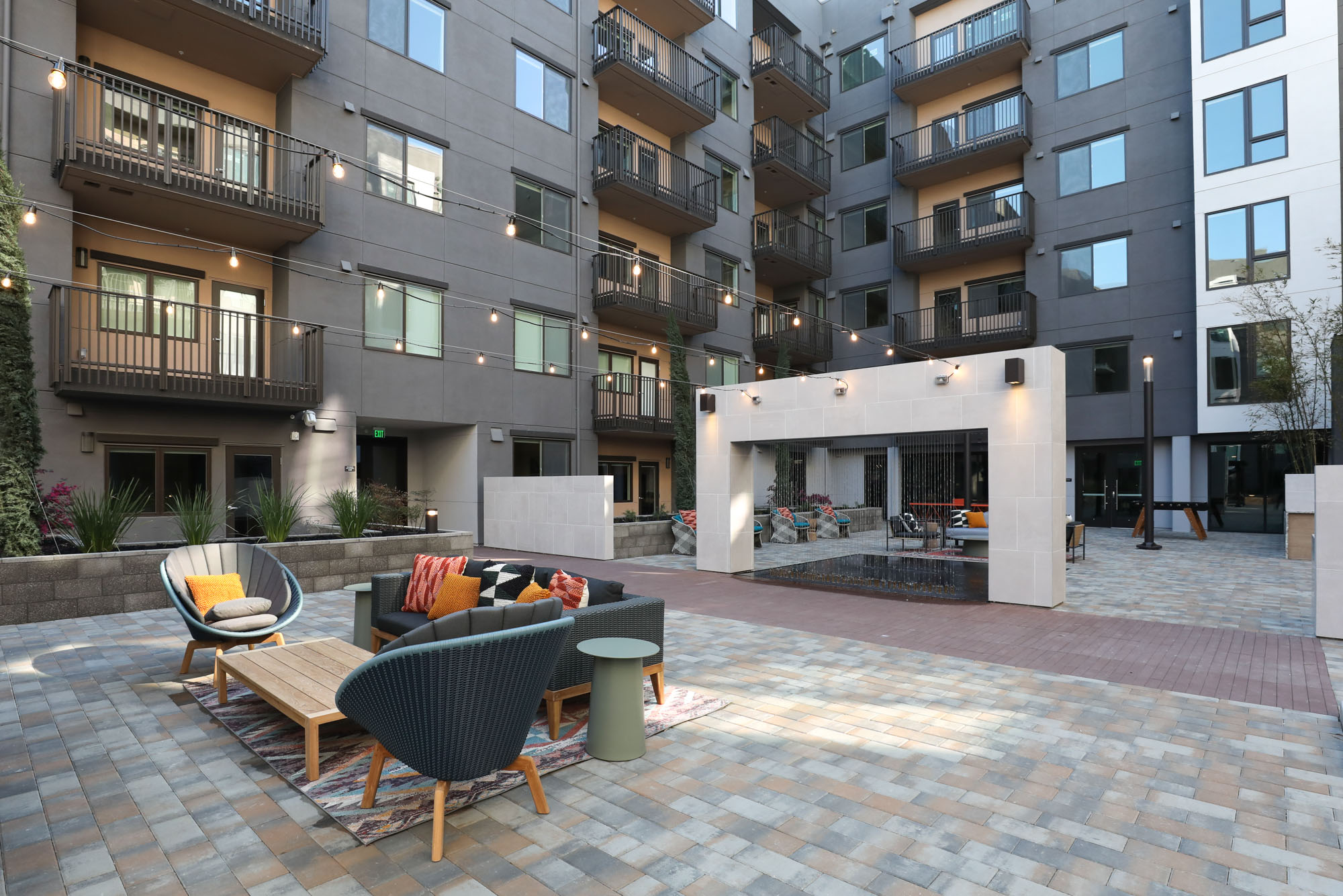 A lounge in the courtyard of the Webster Eleven apartments in downtown Oakland