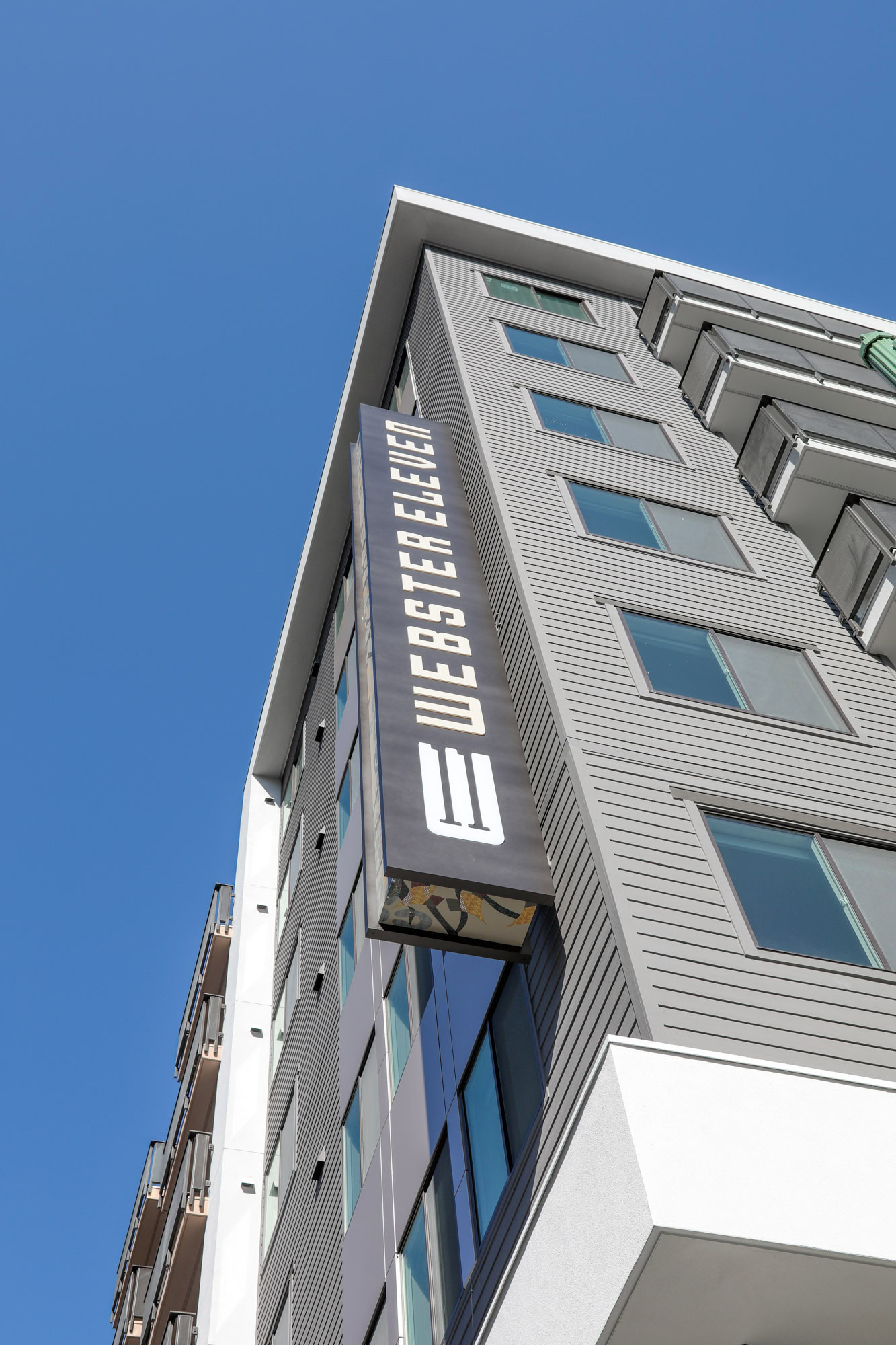 The exterior building of Webster Eleven in downtown oaklands apartment for rent
