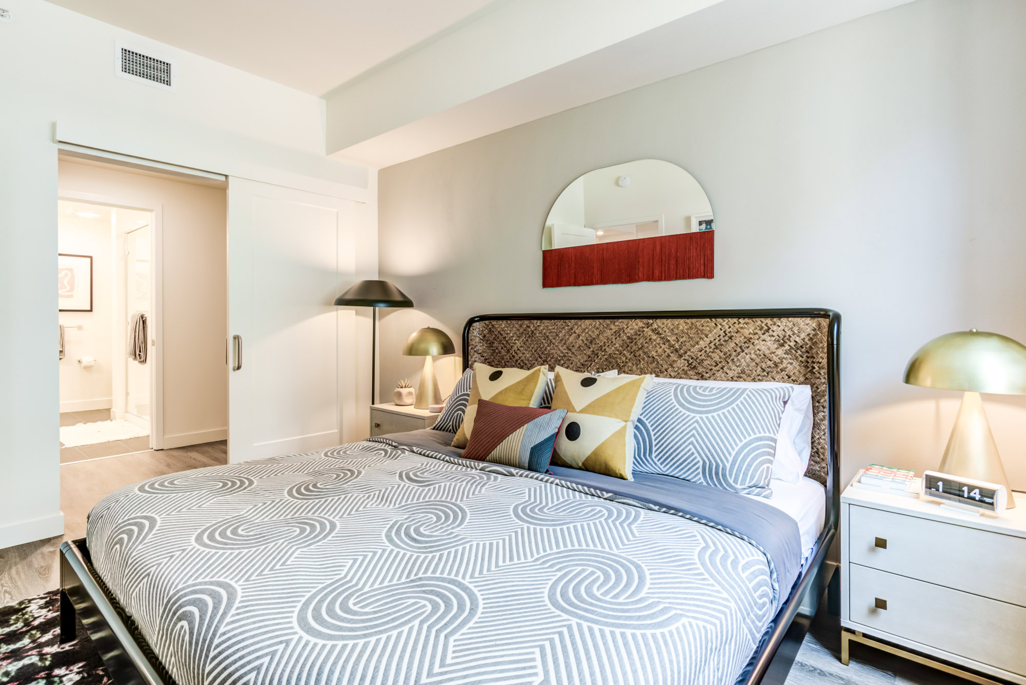 An ensuite bedroom at the Webster Eleven downtown Oakland apartments for rent 