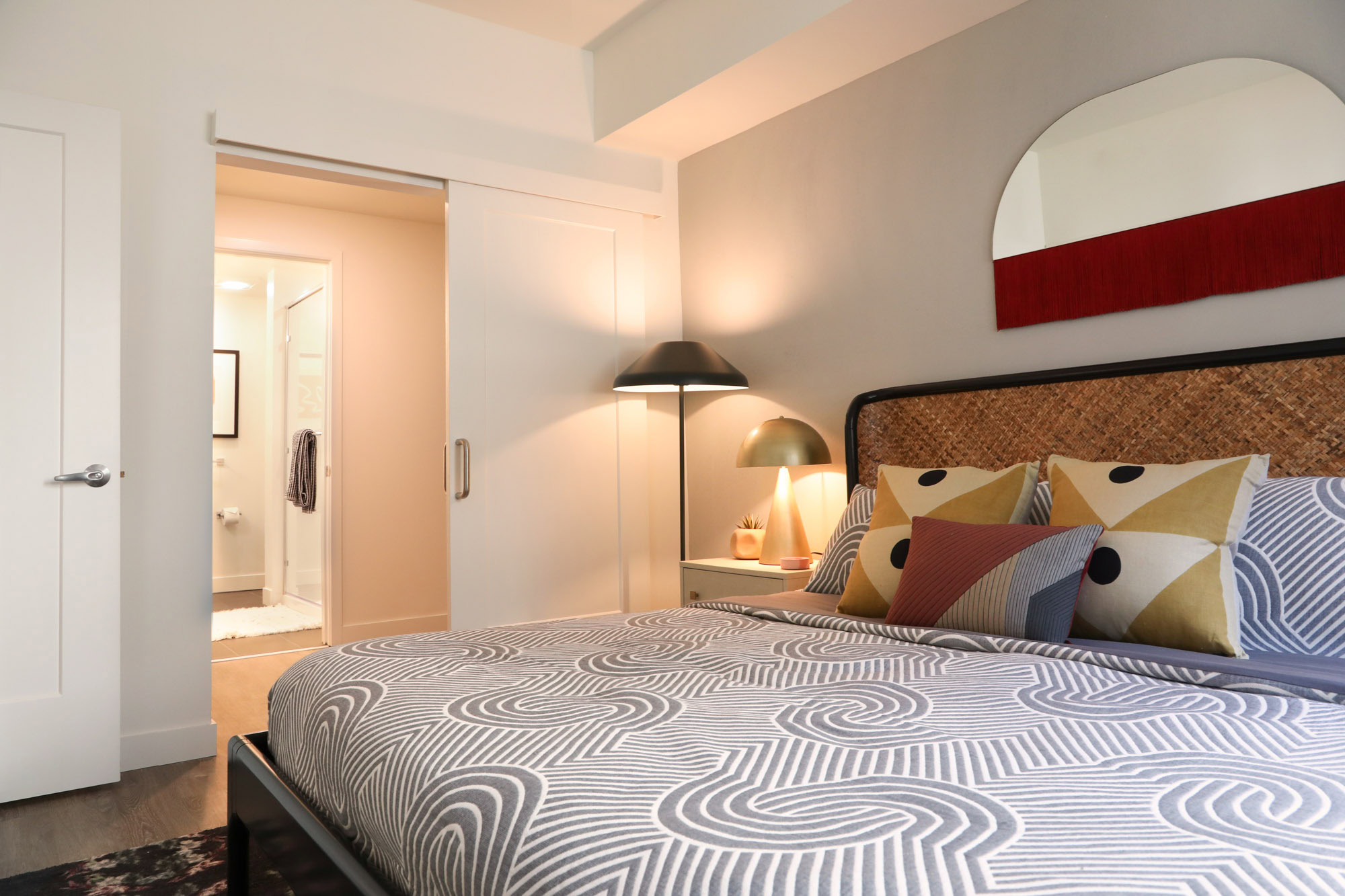 An ensuite bedroom at the Webster Eleven downtown Oakland apartments for rent 