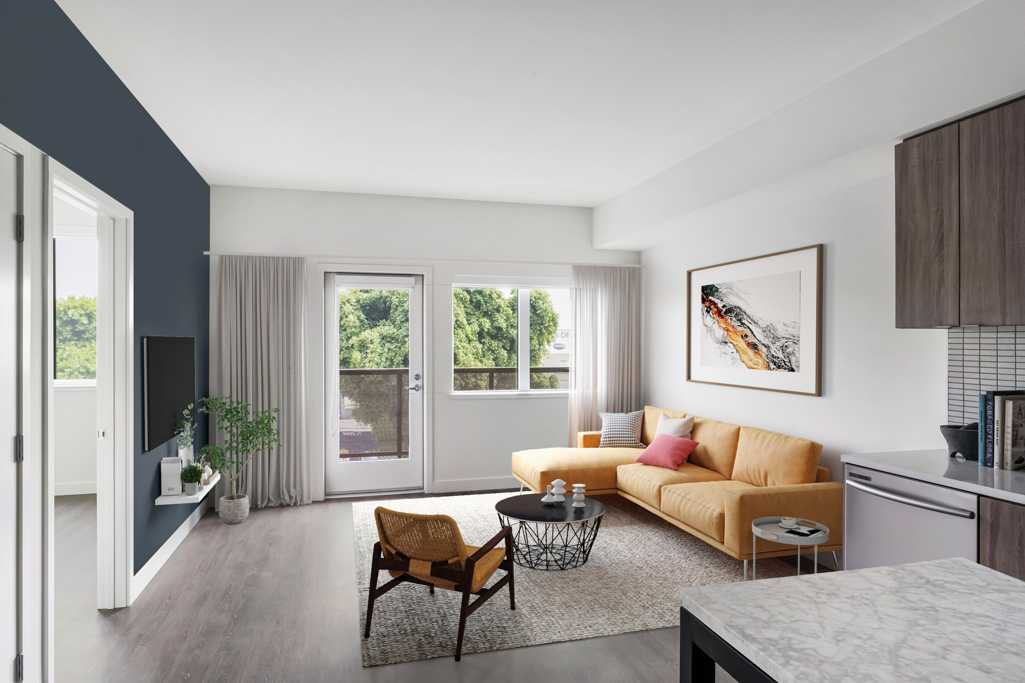 A living area with a door leading to bedrooms at the Webster Eleven apartments in downtown Oakland