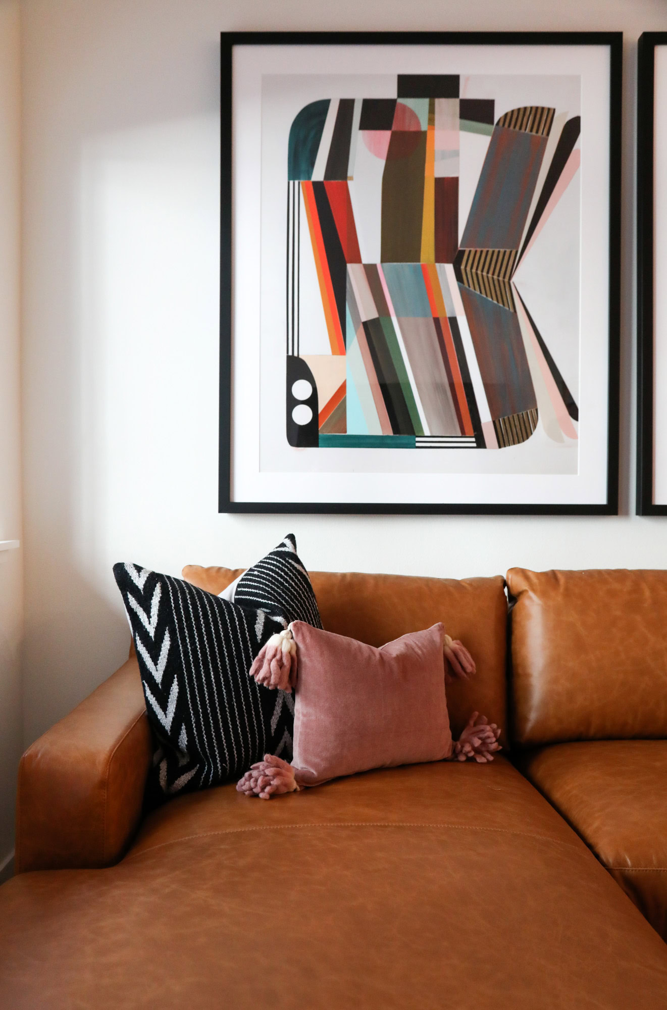 A leather couch in a living room area at the Webster Eleven apartments in downtown Oakland