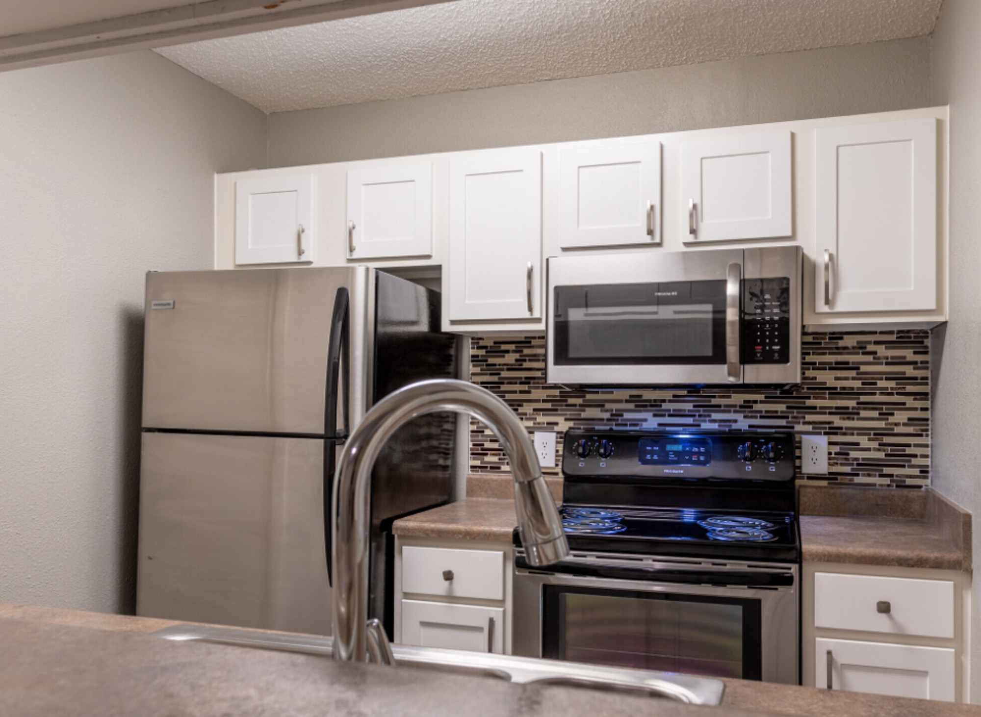 An apartment kitchen at Millbrook apartments in Raleigh, NC.