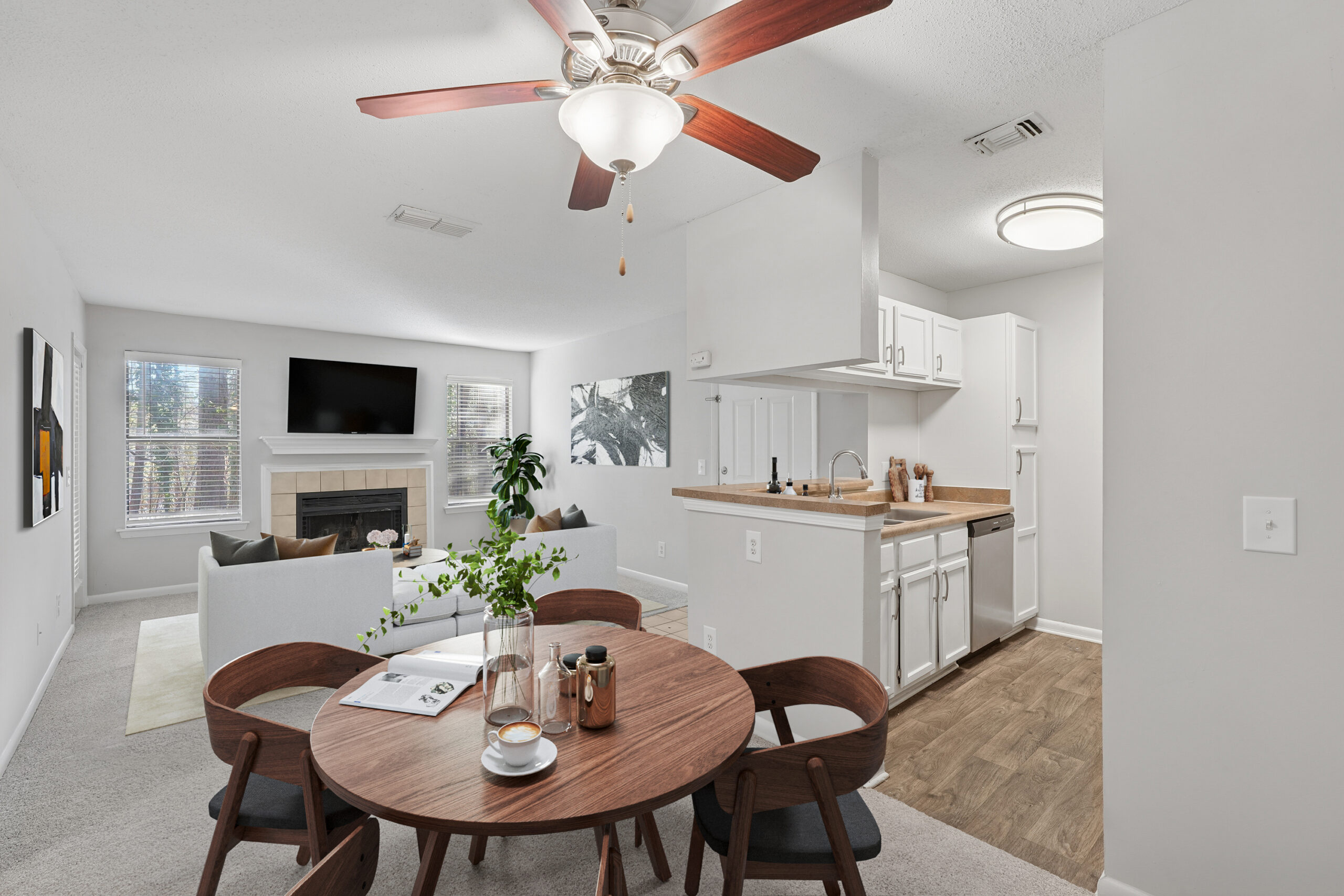 Spacious open concept living room and dining space with fully equipped kitchen