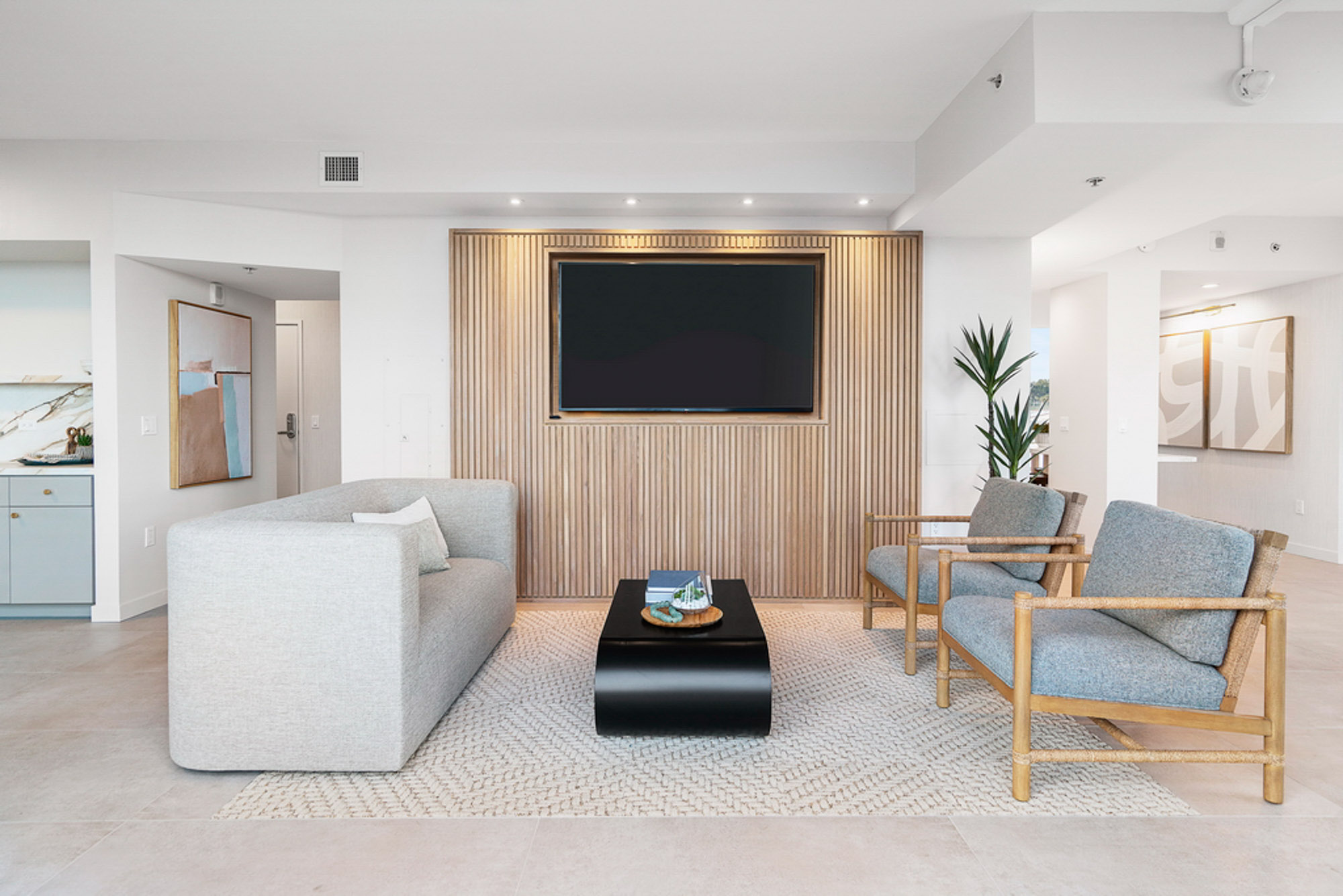 Club room seating area at Vantage Pointe apartments in San Diego, CA