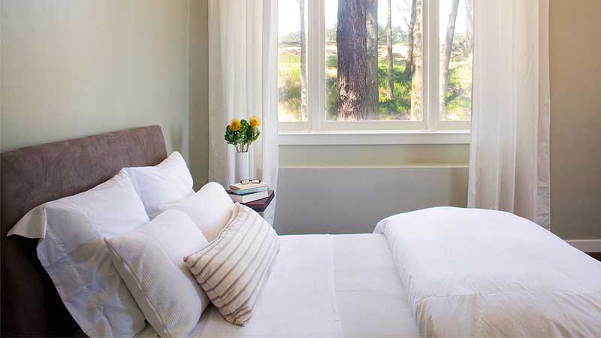 A bedroom in a Presidio Landmark apartment in San Francisco, CA.