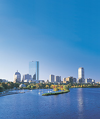 Charles River looking from Cambridge towards Boston with cityscape.