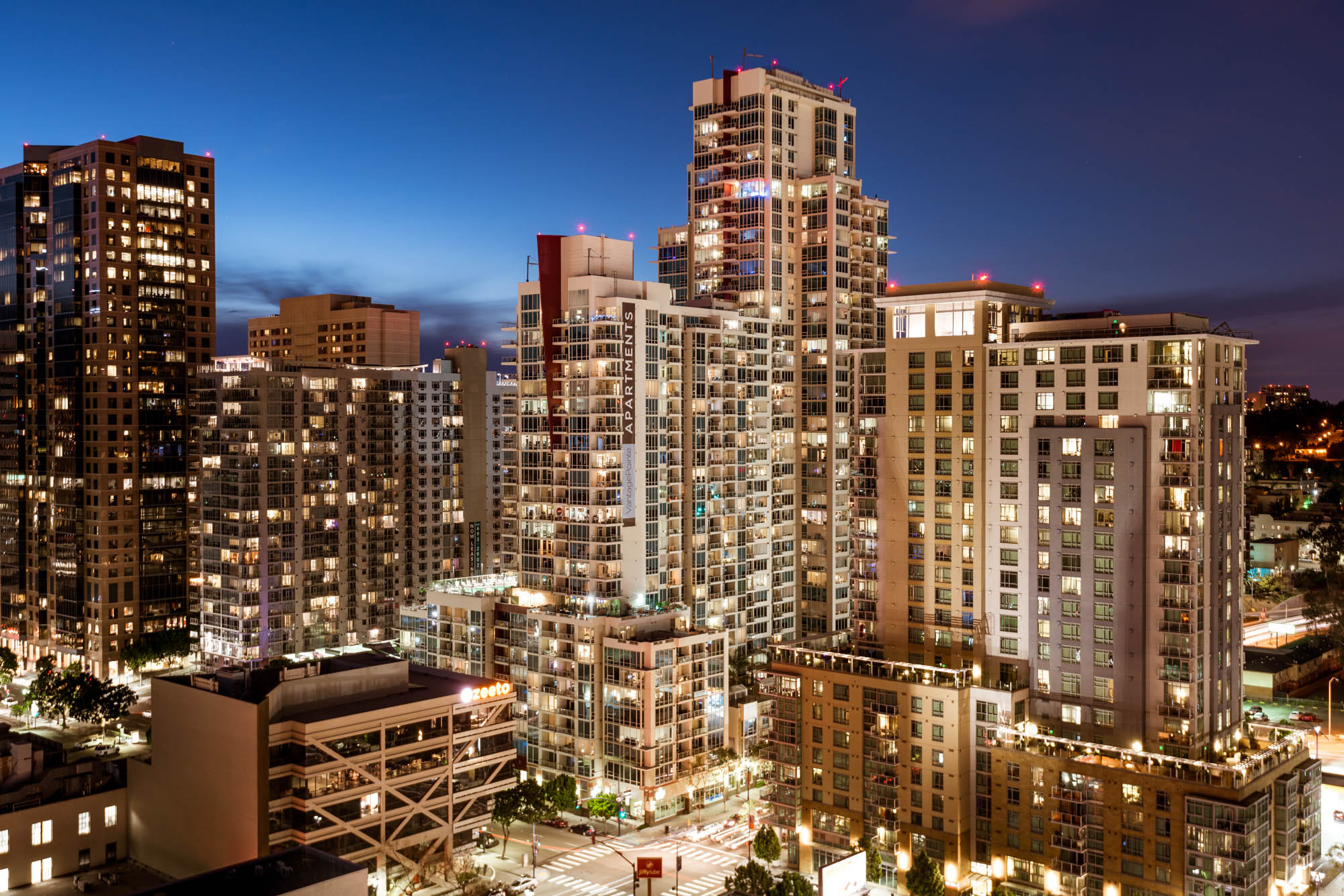 Night time city view of Vantage Pointe apartments in San Diego, CA