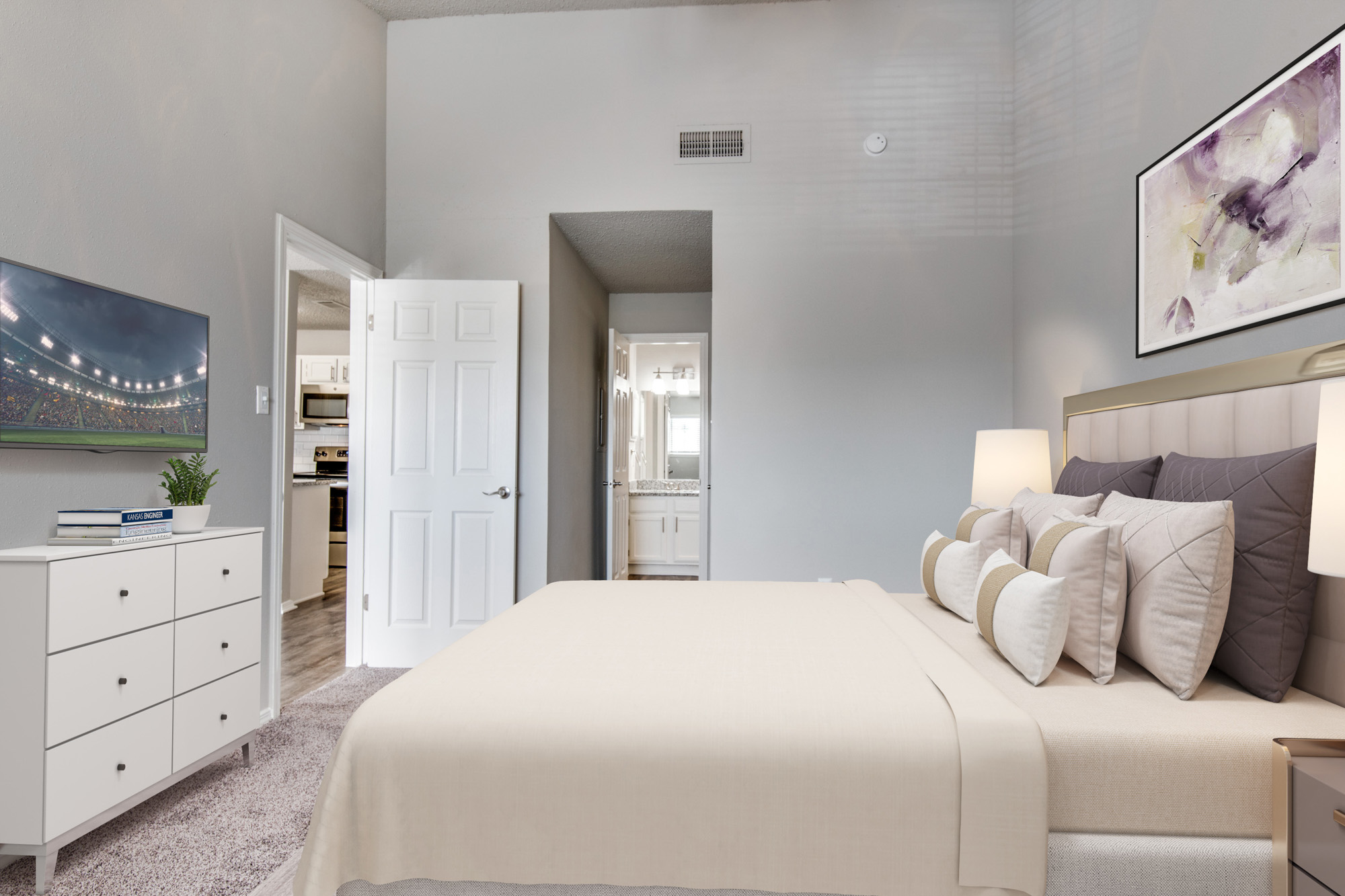 The bedroom in an apartment at The Arbors of Las Colinas in Irving, Texas.