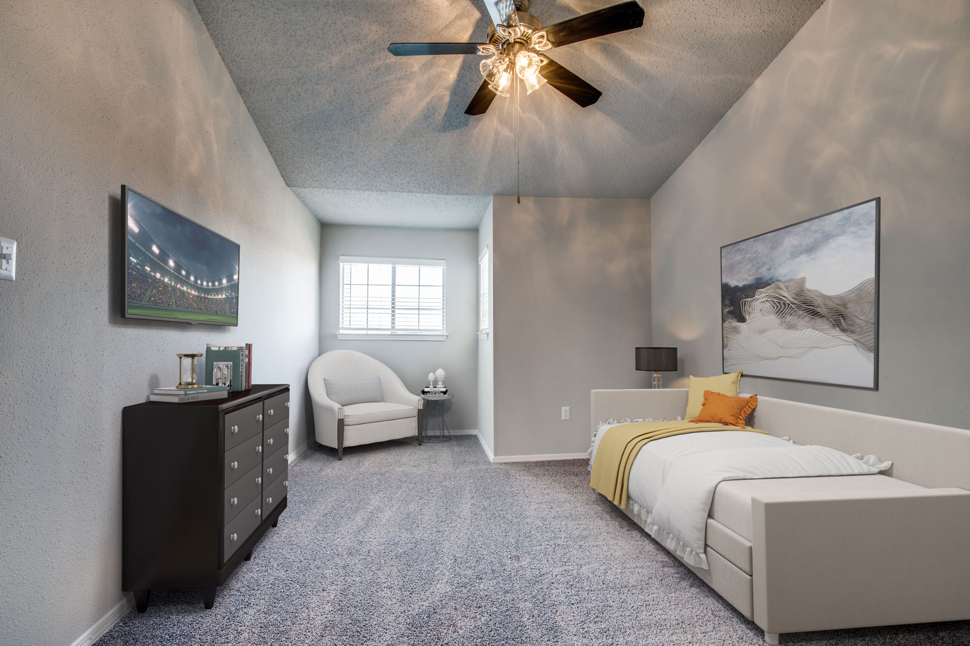 The bedroom in an apartment at The Arbors of Las Colinas in Irving, Texas.