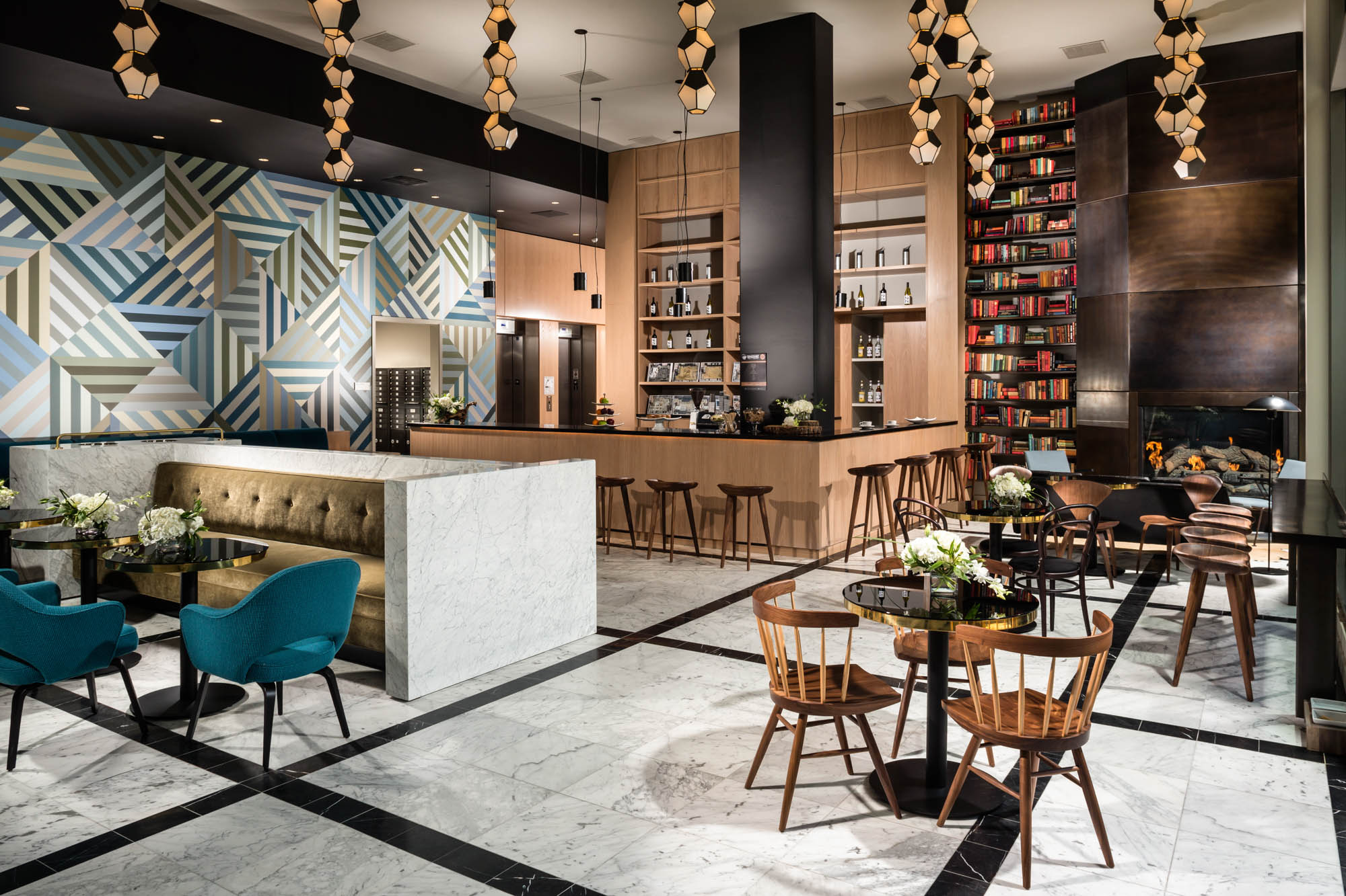 The 8th and Grands luxurious lobby area with various seating options and a bar area in Downtown LA