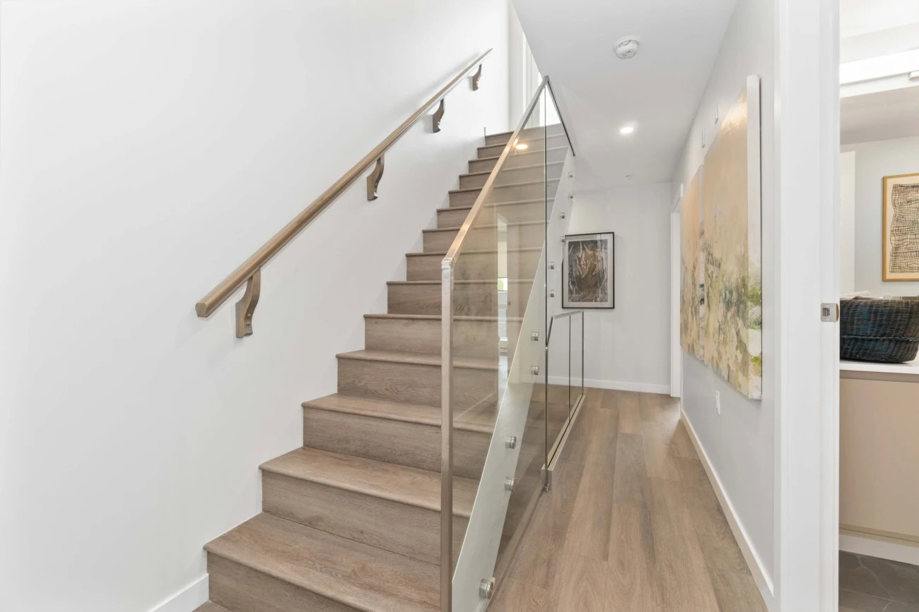 Stairs in a luxury apartment at the Hendry Place pet-friendly apartments Vancouver BC