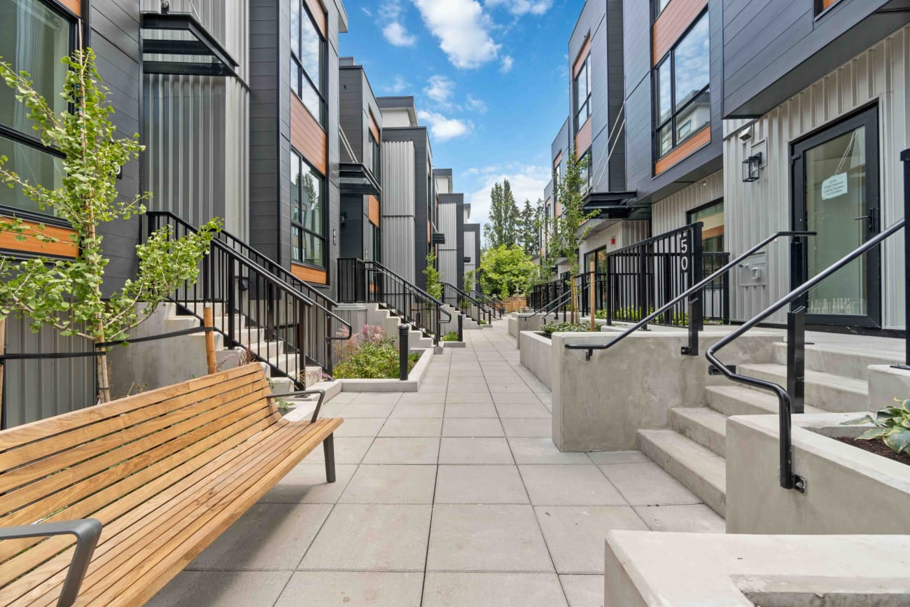 A pathway with stairs leading to units at the Hendry Place luxury apartments in Vancouver