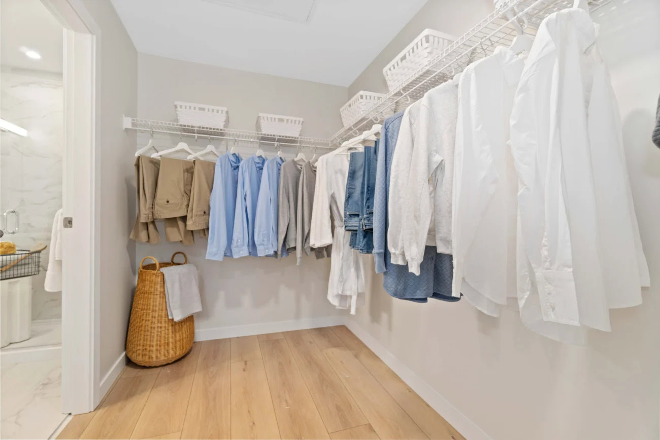 A spacious walk-in closet in an apartment at the Hendry Place vancouver east side apartments for rent