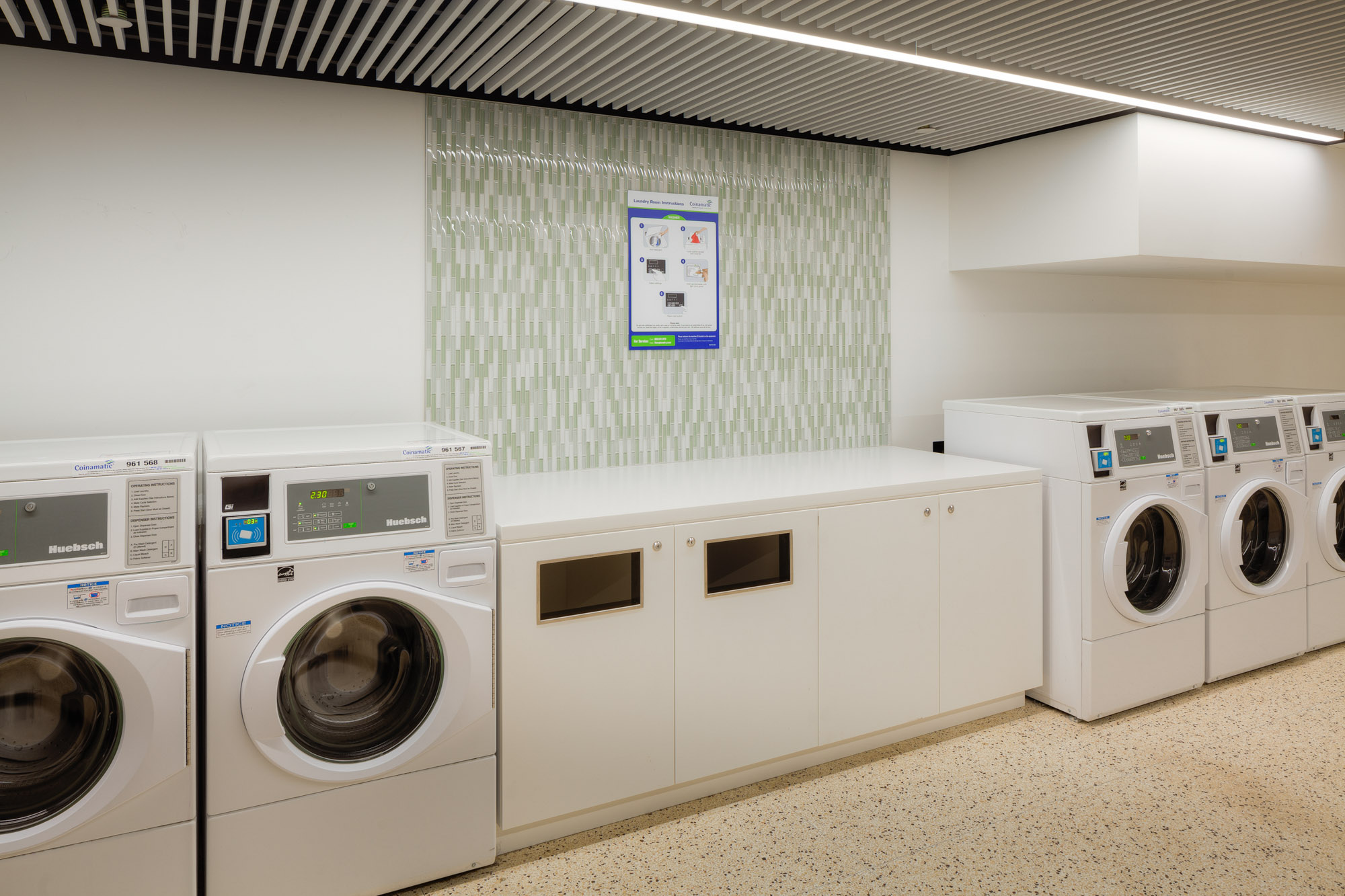 The onsite laundry facility at 77 Davisville Ave in Toronto, CA.