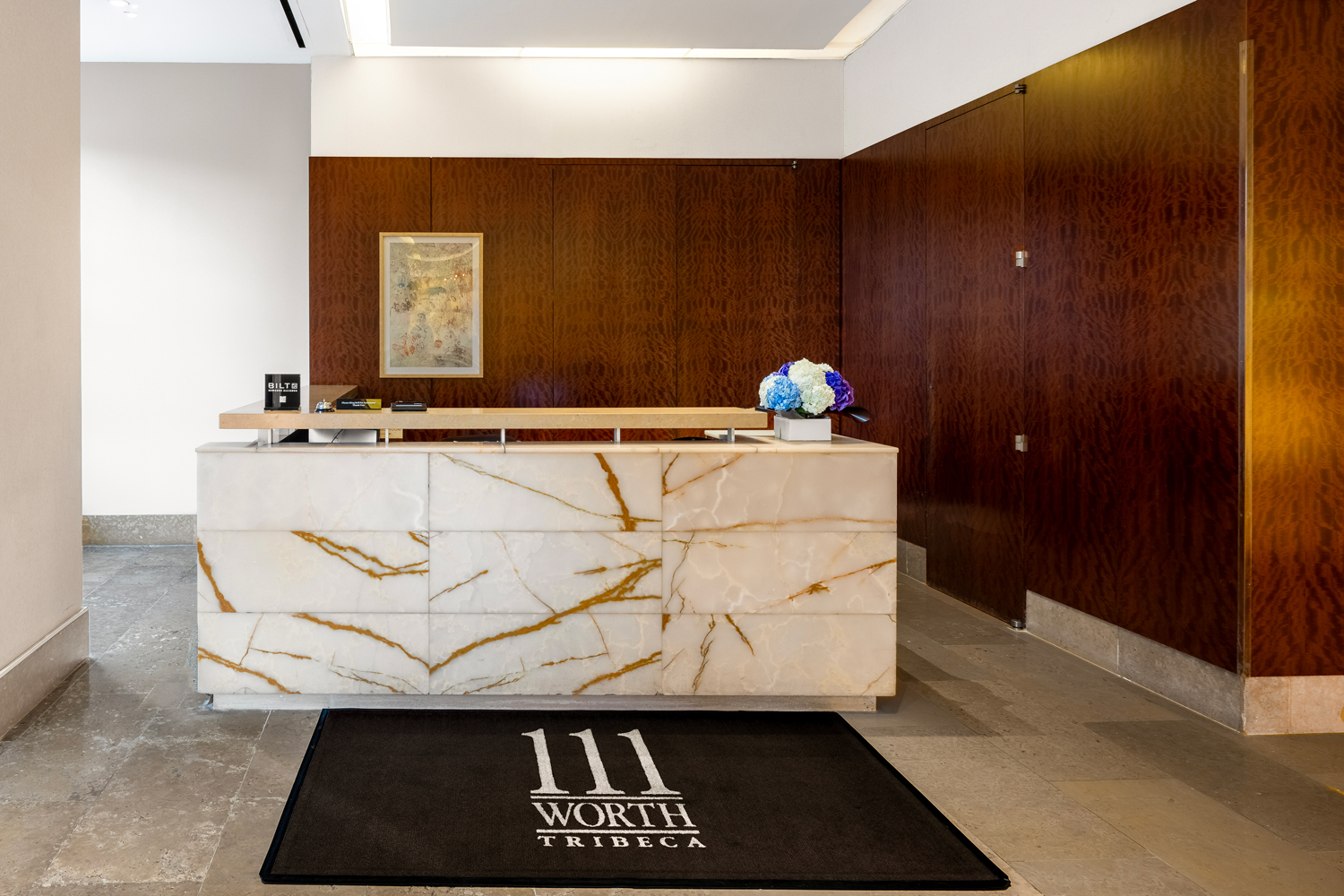 Concierge desk within the lobby of 111 Worth