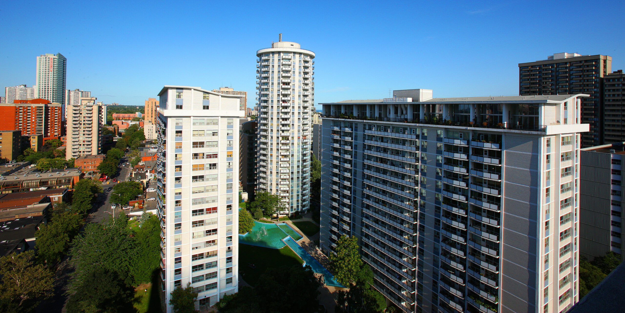 The three apartment communities that are a part of Village Green in Toronto, CA.