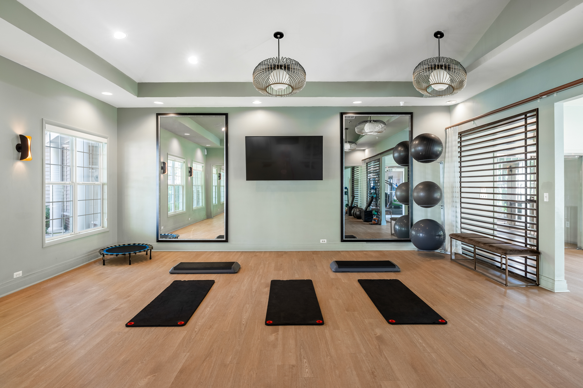 Yoga studio with equipment available.