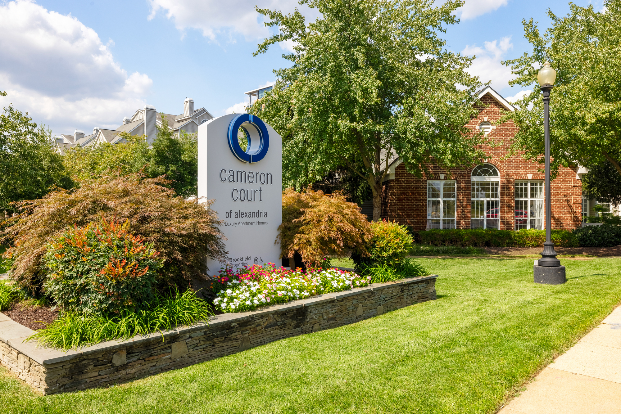 Entry to Cameron Court with sign indicating you have arrived.