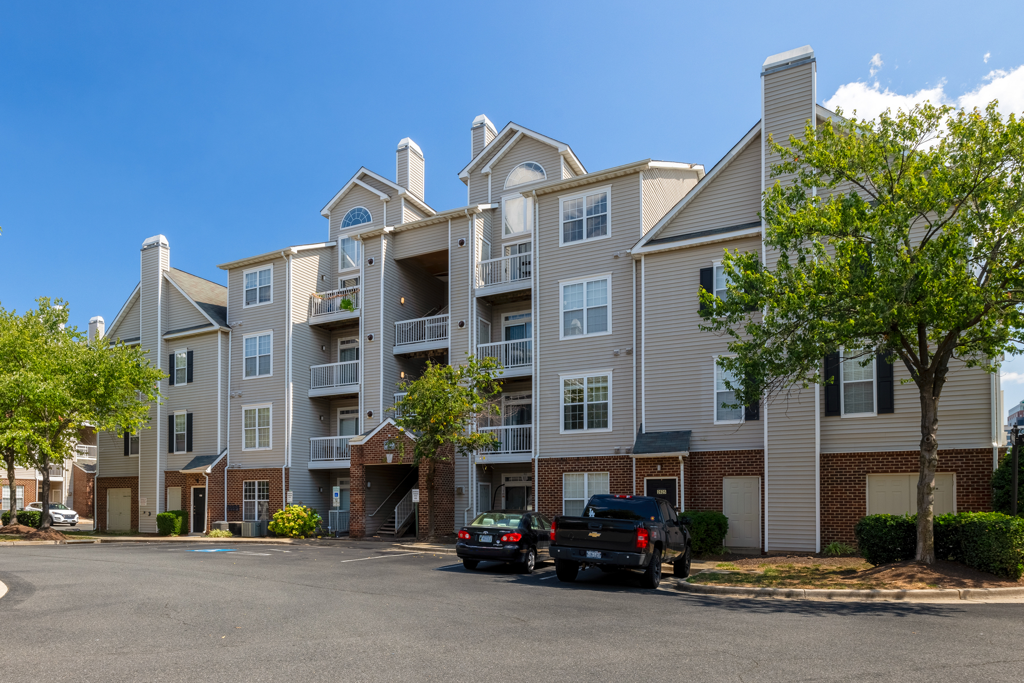 Exterior of Cameron Court with attached garages available.