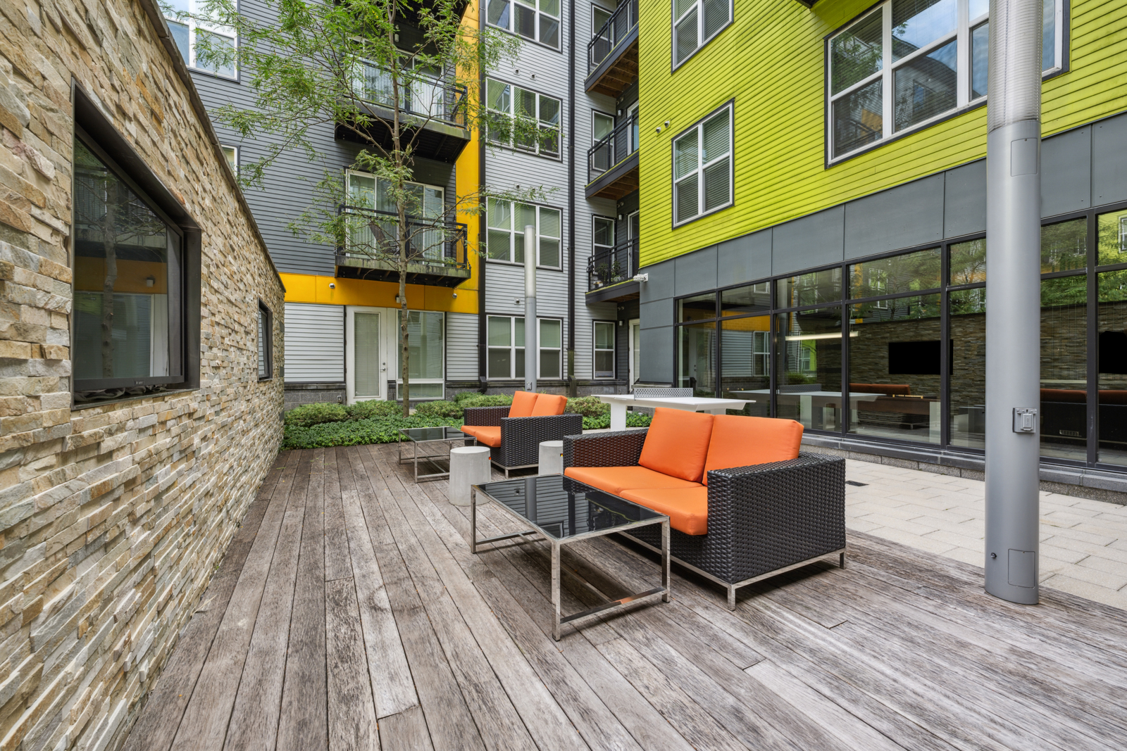 Exterior courtyard with flatscreens.