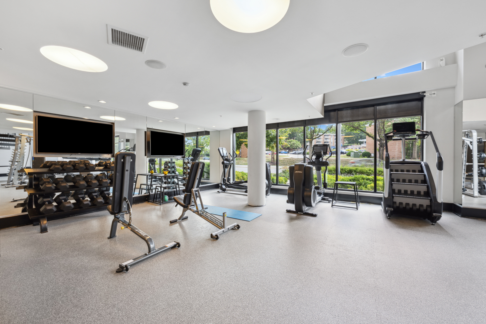 Expansive fitness center encompassing two stories.