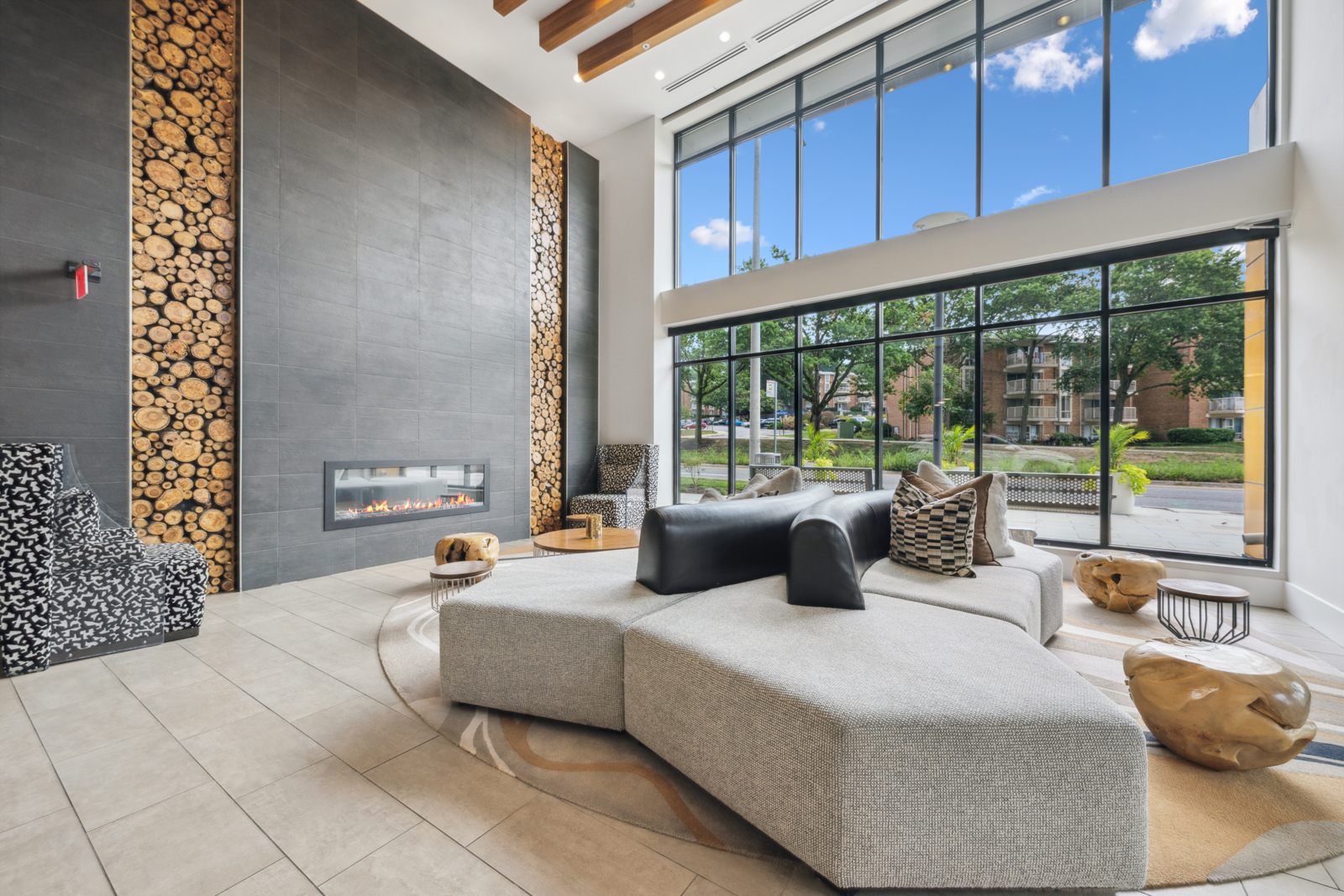 Warm and inviting lobby at The Parker with expansive windows.