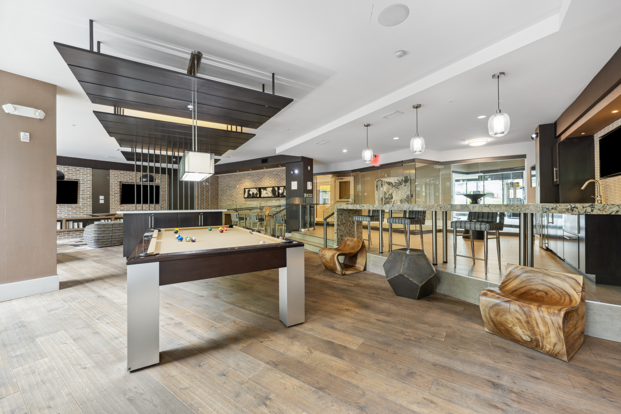 Interior lounge area at The Parker with billiards.