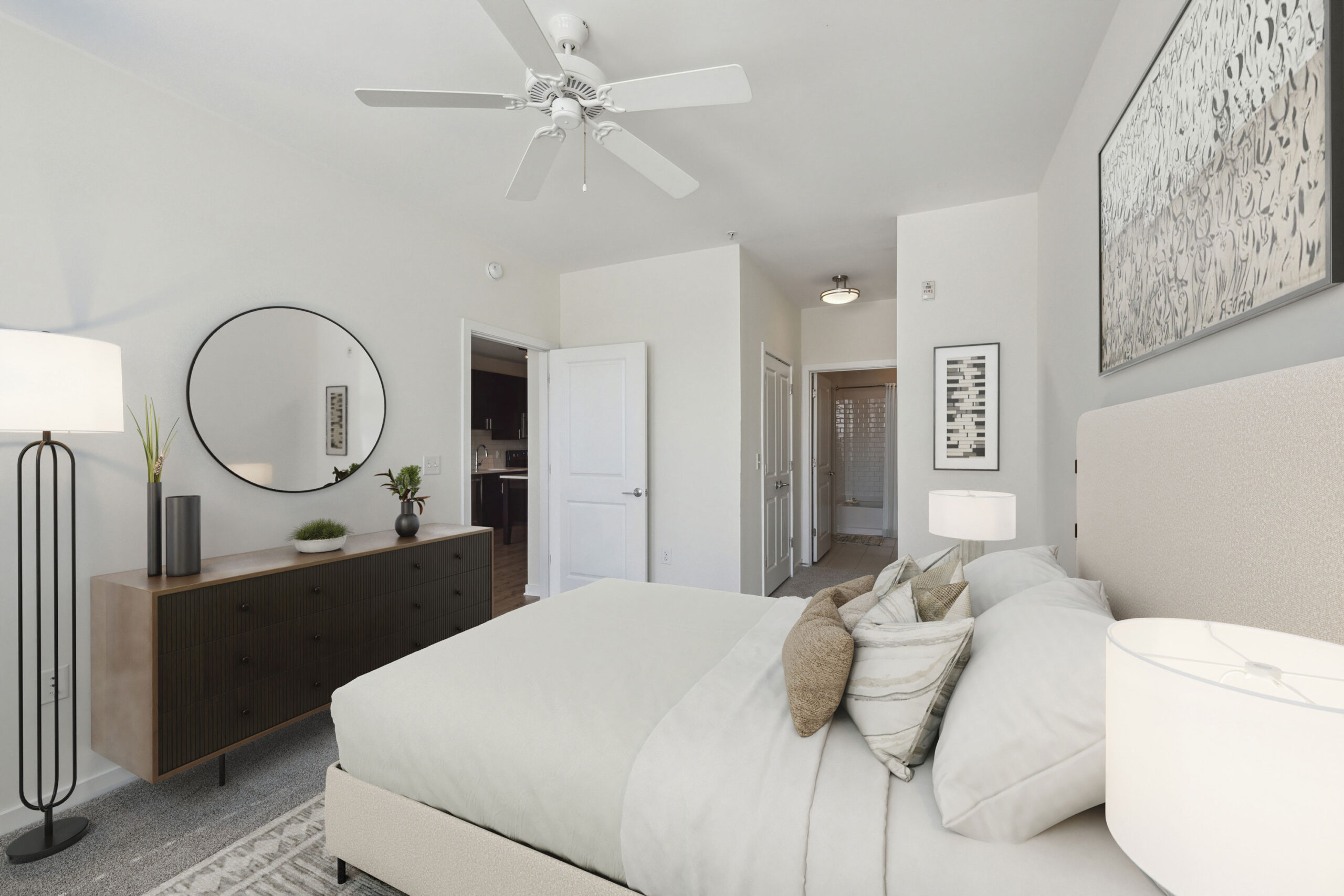 Spacious bedroom with the bath entry in the background.