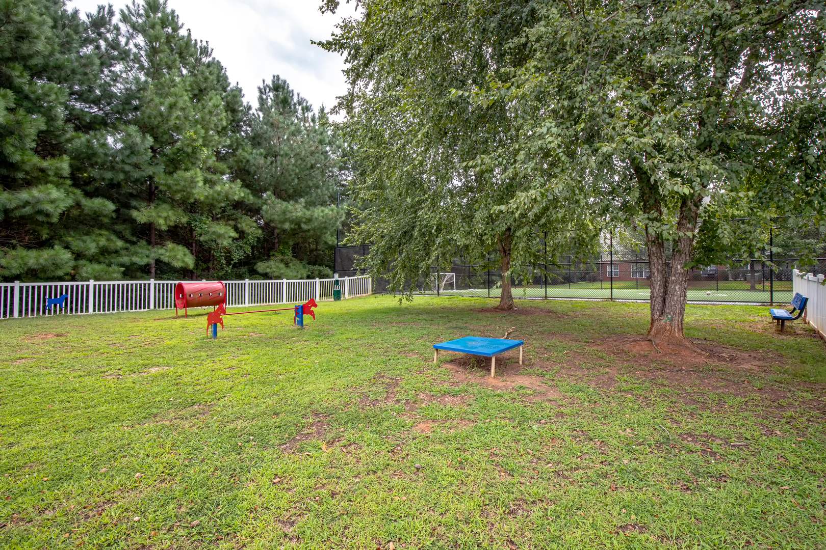 A park with benches at the Ashford Place apartments in South Charlotte