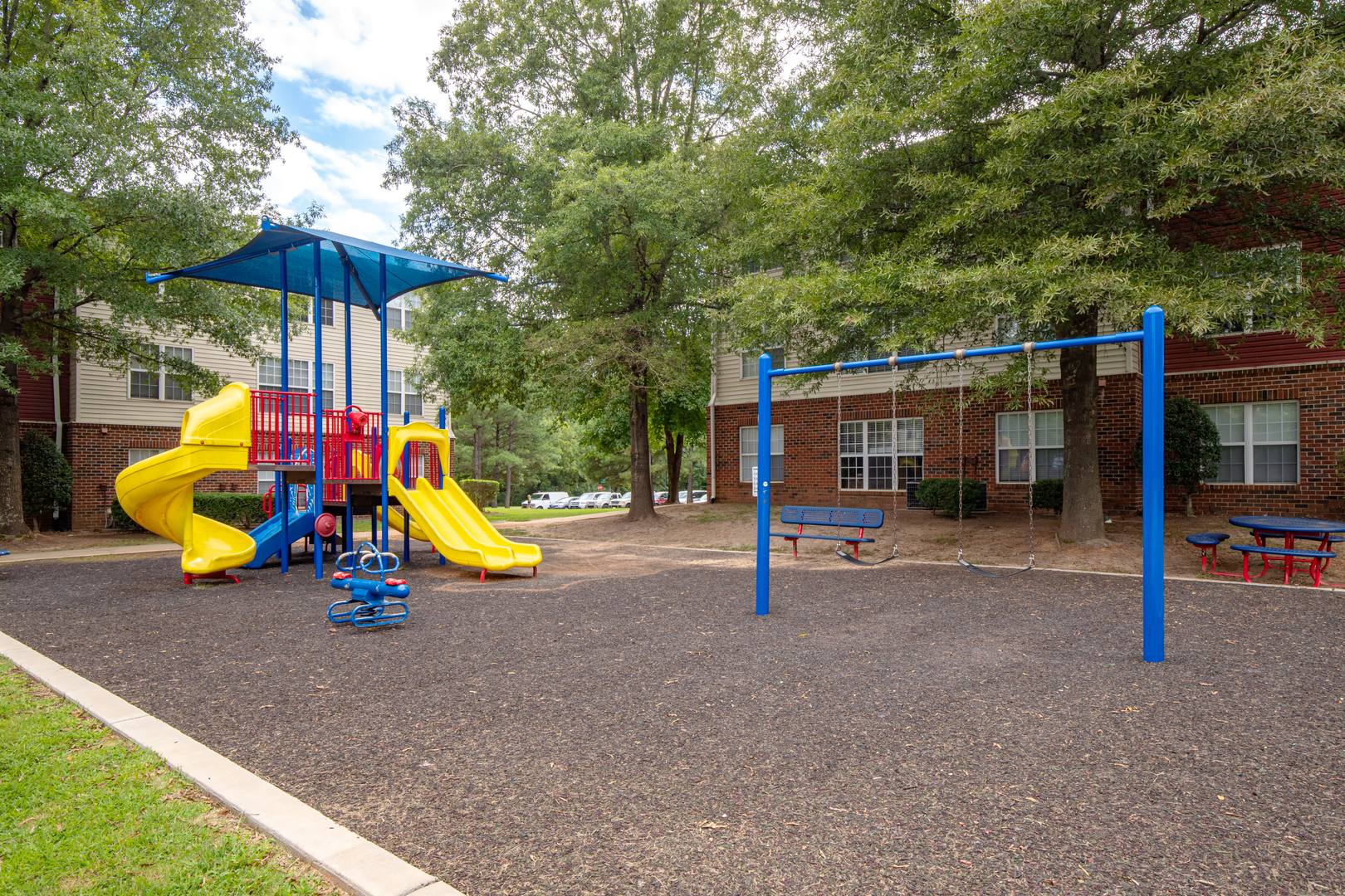 An outdoor playground at the Ashford Place apartments in South Charlotte