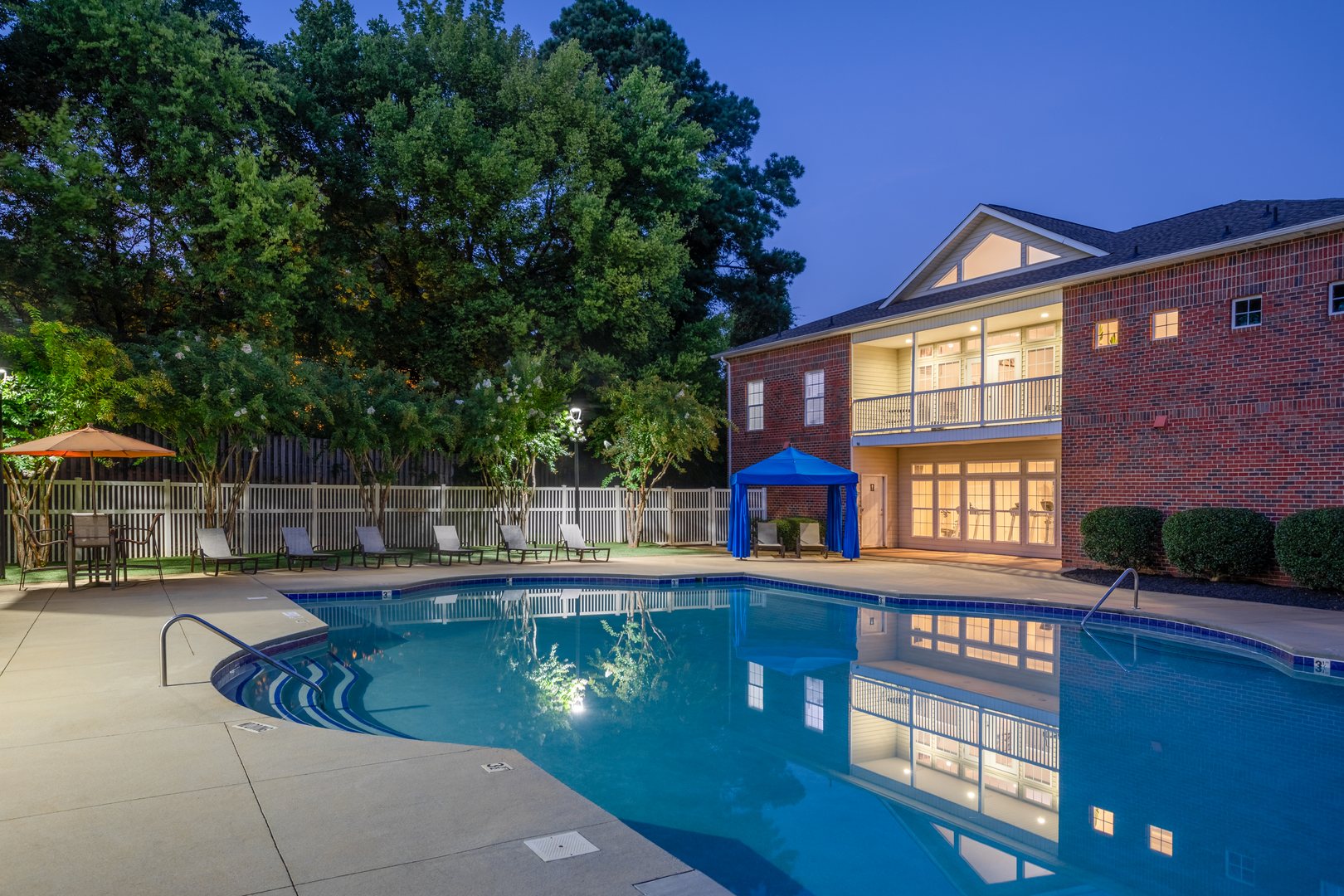 The pool area in the evening at the Ashford Place apartments in South Charlotte