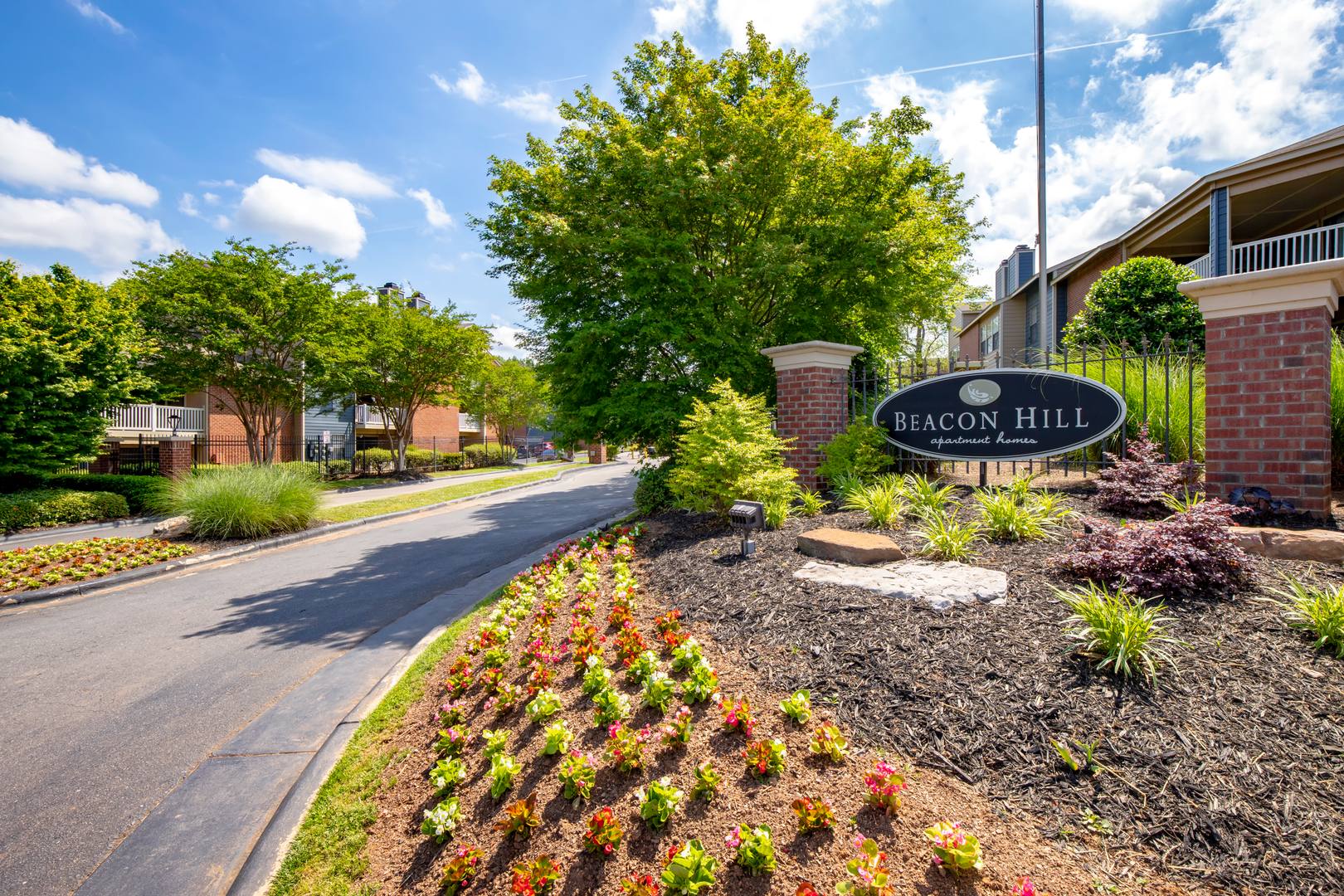 The entrance garden and sign at the Beacon Hill apartments at the south end of Charlotte, NC