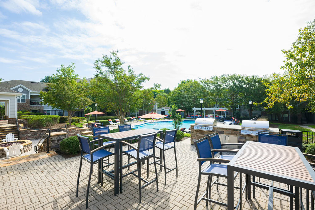 Outdoor high table picnic tables by the grilling station and pool at the Courtney Ridge apartments at the south end of Charlotte, NC
